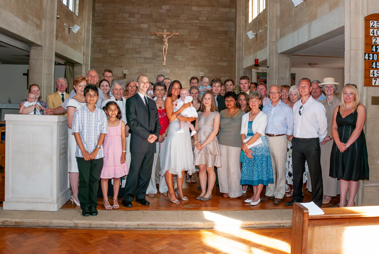 Amalie is surrounded by guest after her baptism.