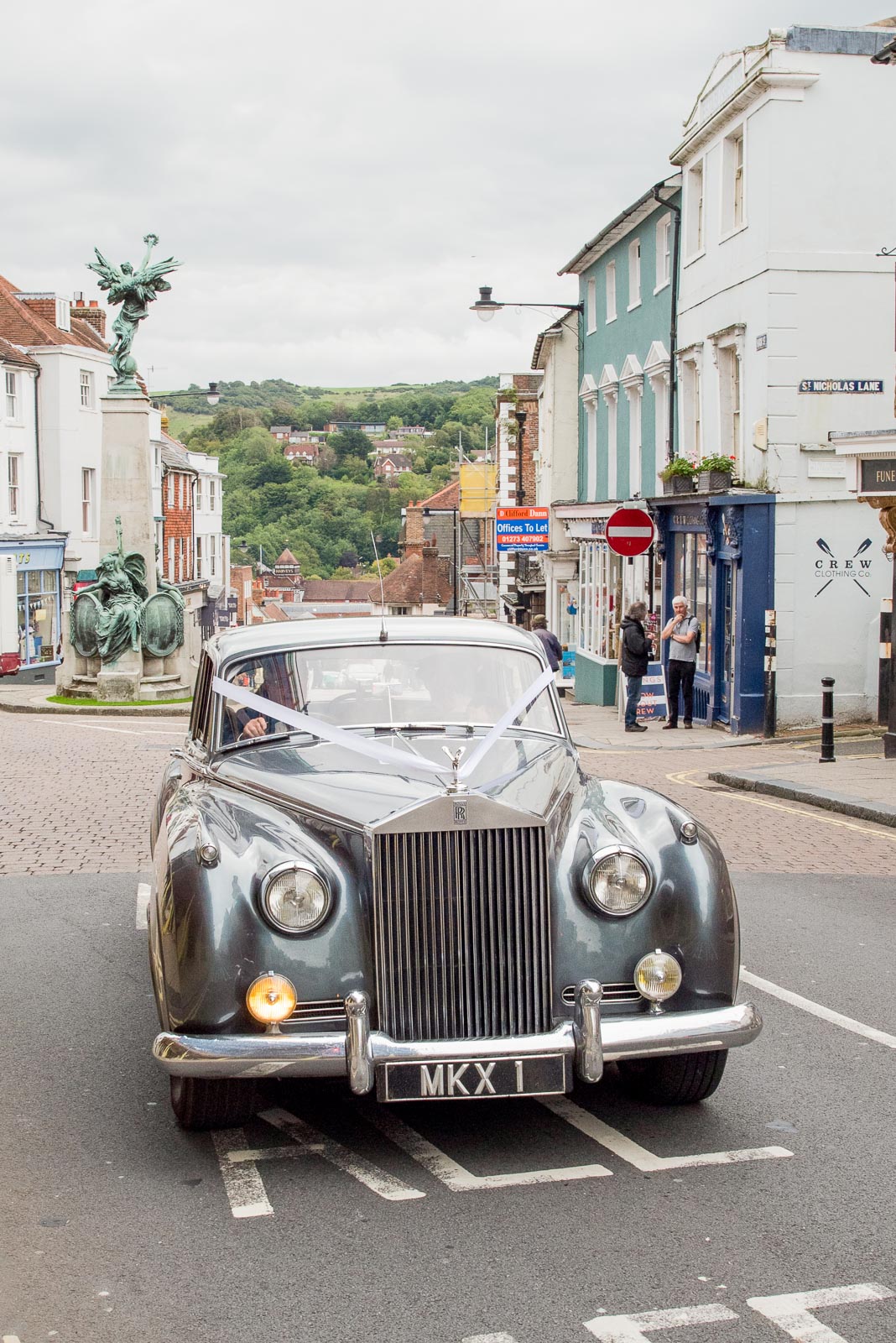 Emily and Richard arrive at Lewes Town Hall for the wedding in a vintage Rolls Royce.