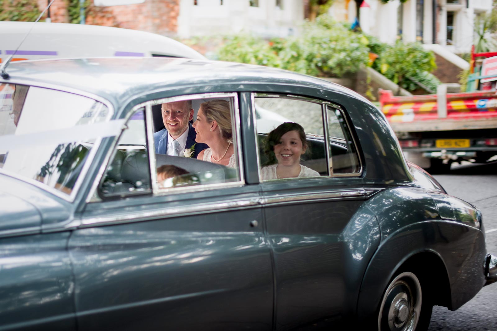 Emily and Richard depart from their wedding at Lewes Town Hall in a vintage Rolls Royce.