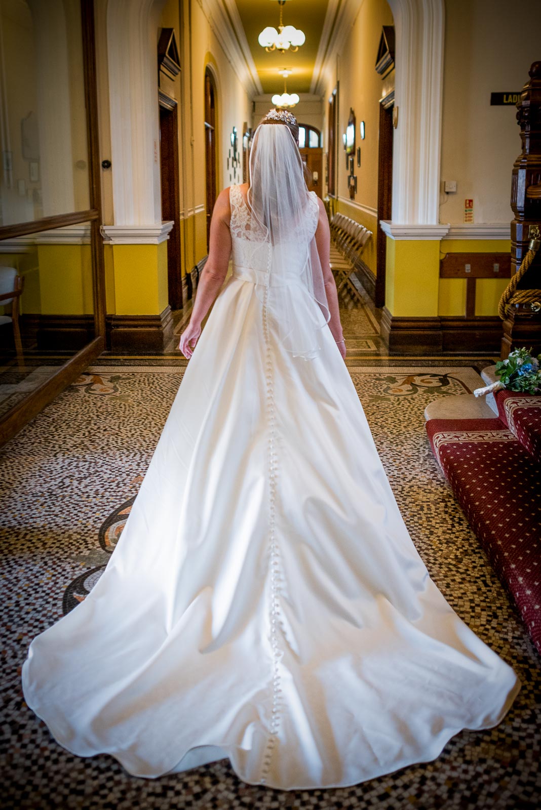 Donna's wedding dress photographed from behind.