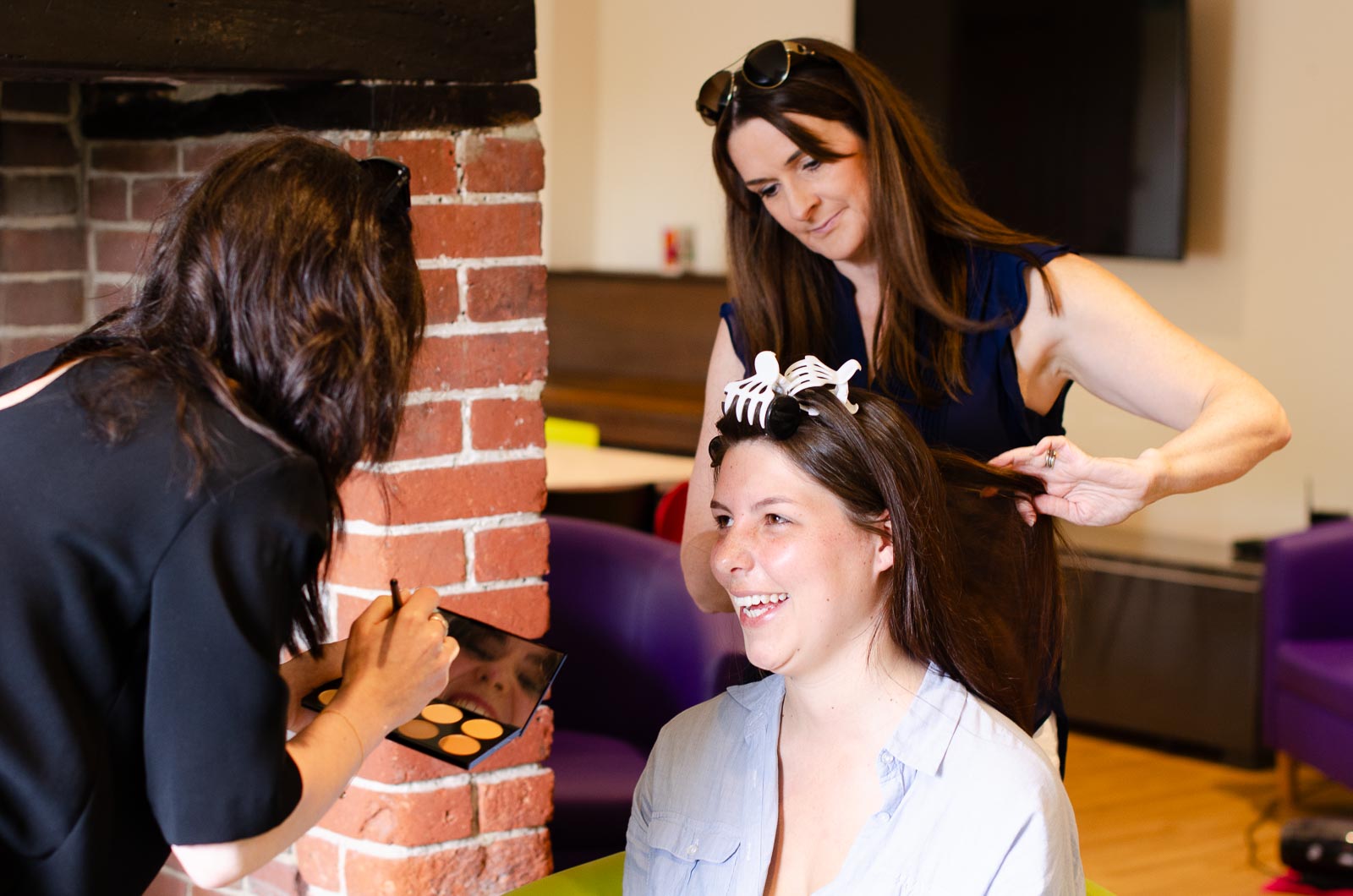 Toni has her hair done in the farmhouse at Nutley Edge before her wedding.