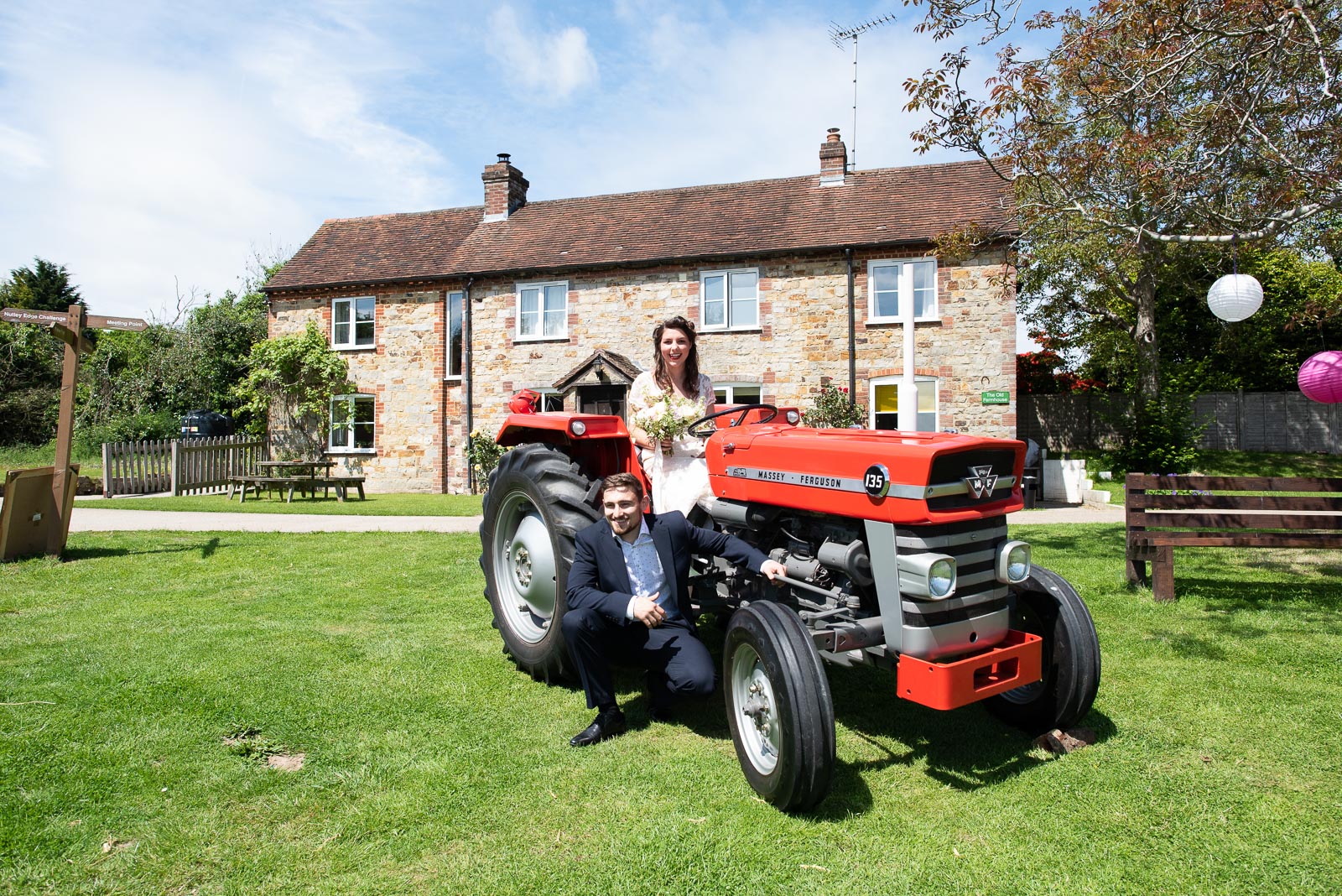 Luke and Toni pose on a tractor at Nutle Edge.