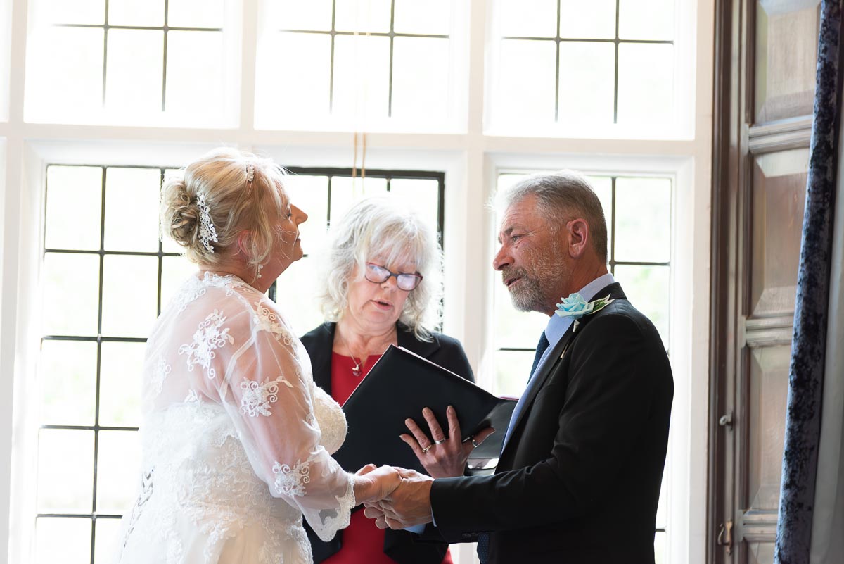 Wendy closes her eyes as Jason delivers his wedding vows in the Ainsworth Room at Lewes Register Office.