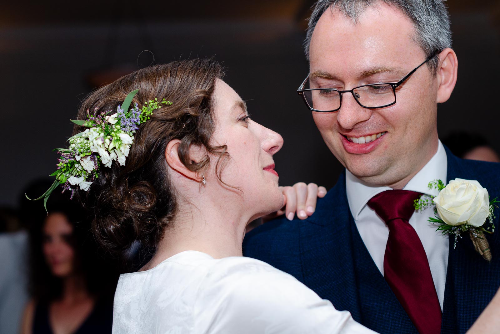Alexis and Niell smile at eachother during their first dance in Pelham House Hotel, Lewes.