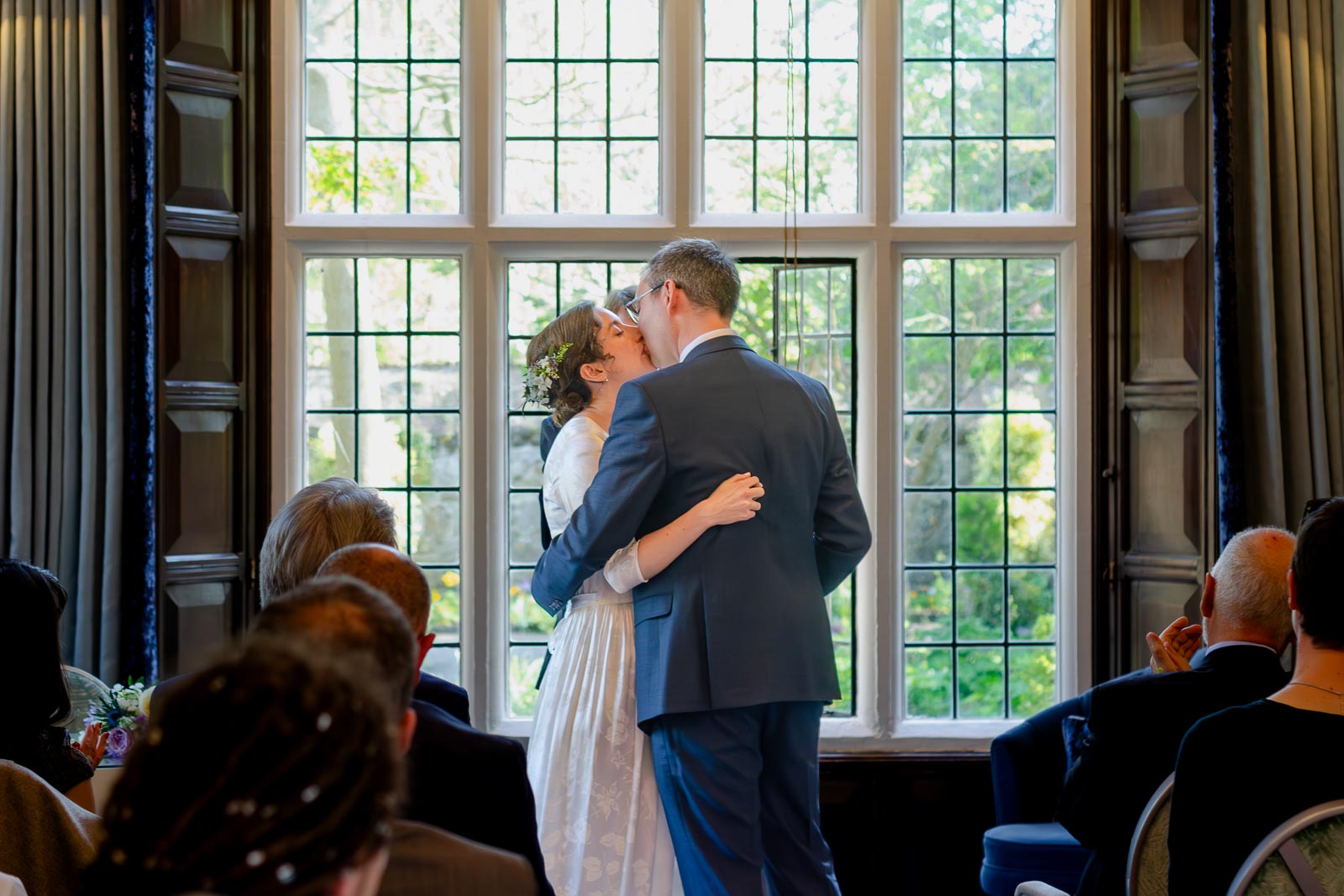 Alexis kisses Niell after their wedding in the Ainsworth Room at Lewes Registry Office.
