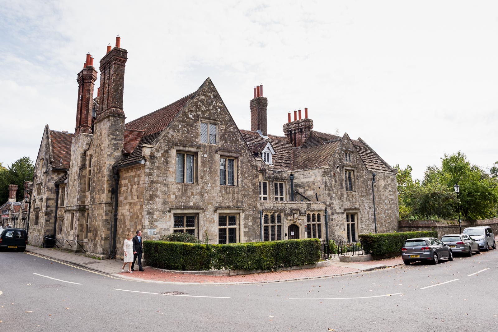 Wendy and Chris walk by the front of Lewes Register Ofiice on their way to their wedding.