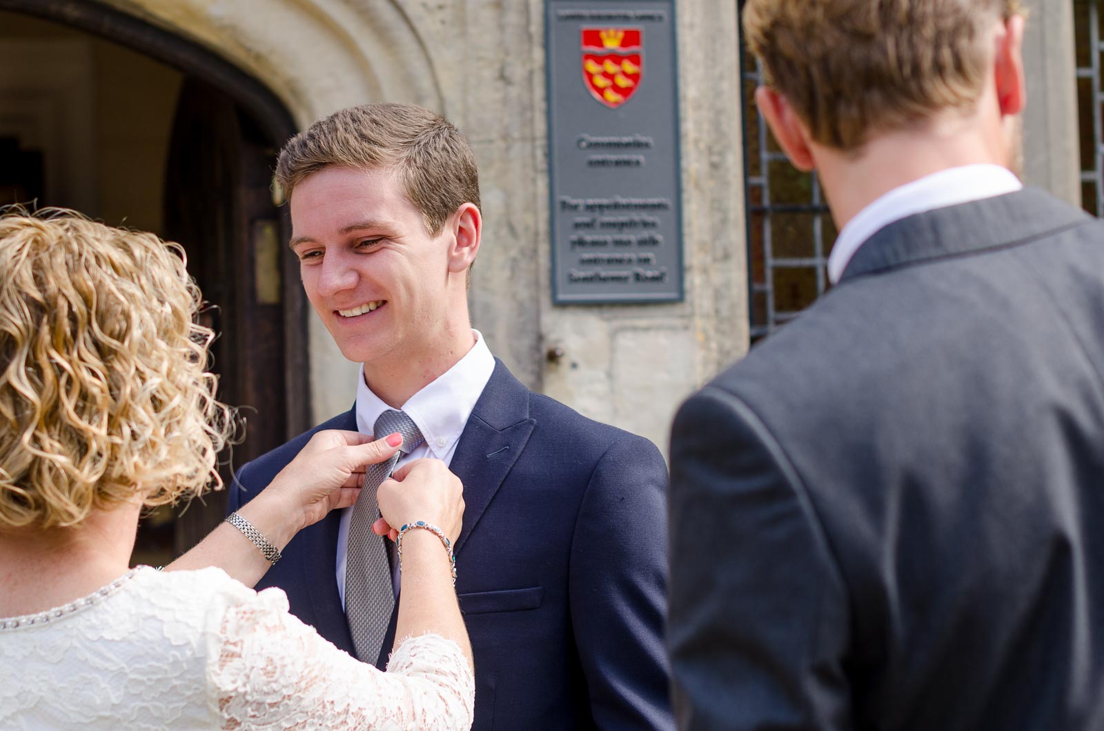Wendy adjusts her son's tie on front of Lewes Register Office before her wedding to Chris.