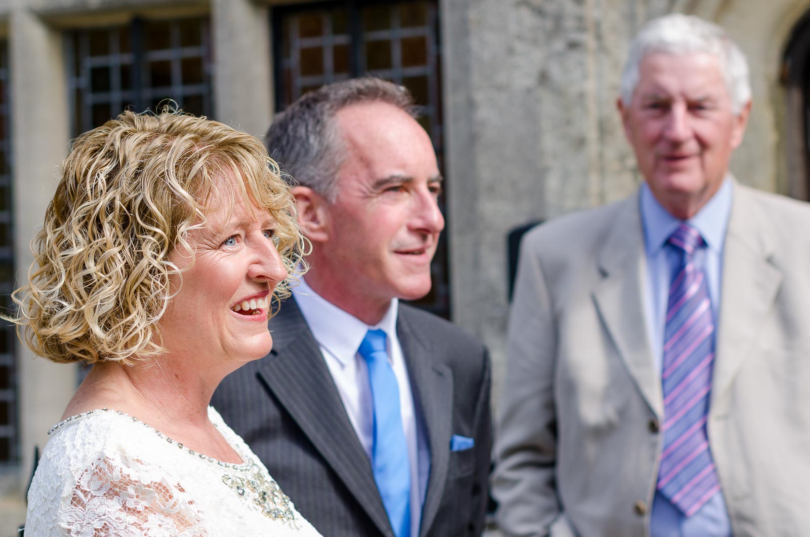 Wendy smiles on front of Lewes Register Office before her wedding to Chris.