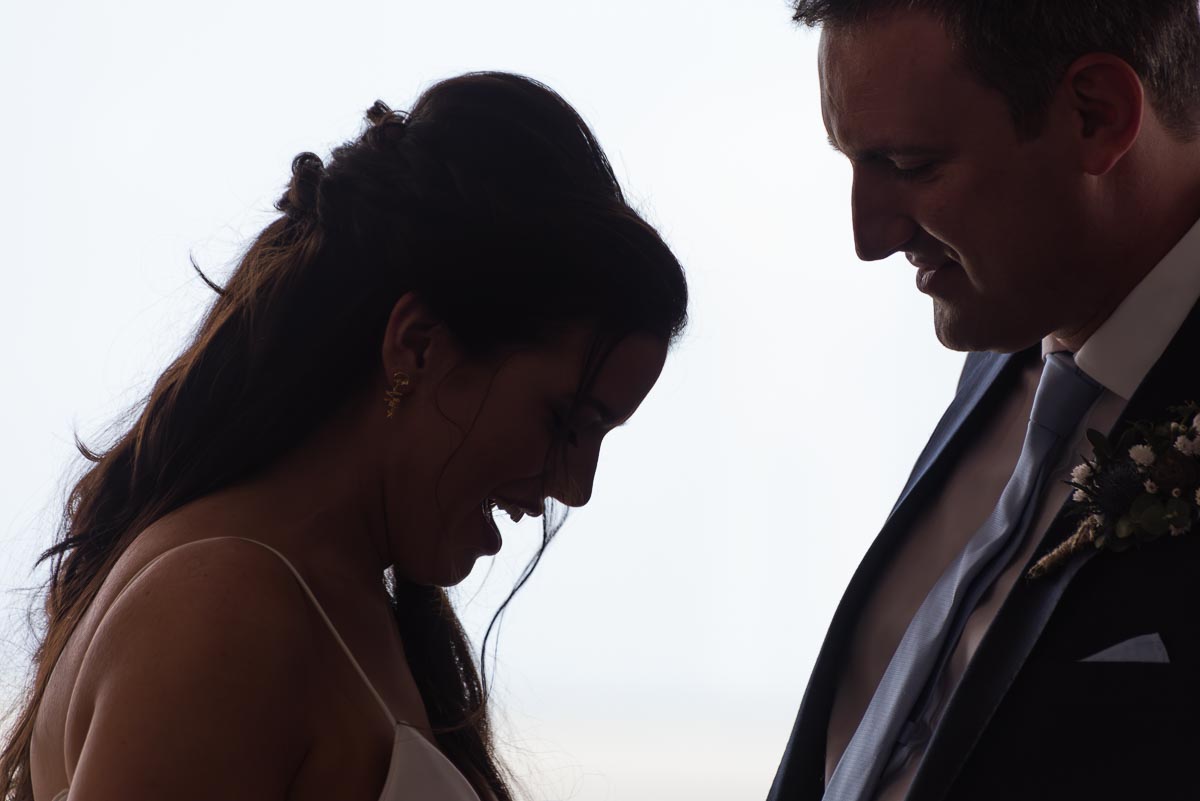 Ally and Jane face eachother during their wedding ceremony at Grand Hotel, Eastbourne.