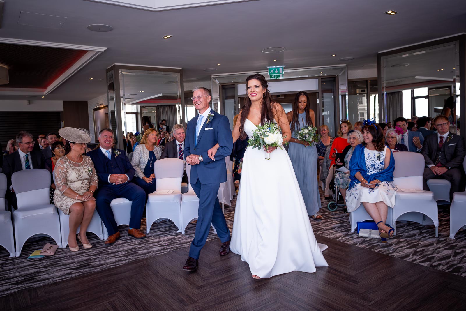 Jane arrives in the arms of her father before her wedding to Ally at Grand Hotel, Eastbourne.