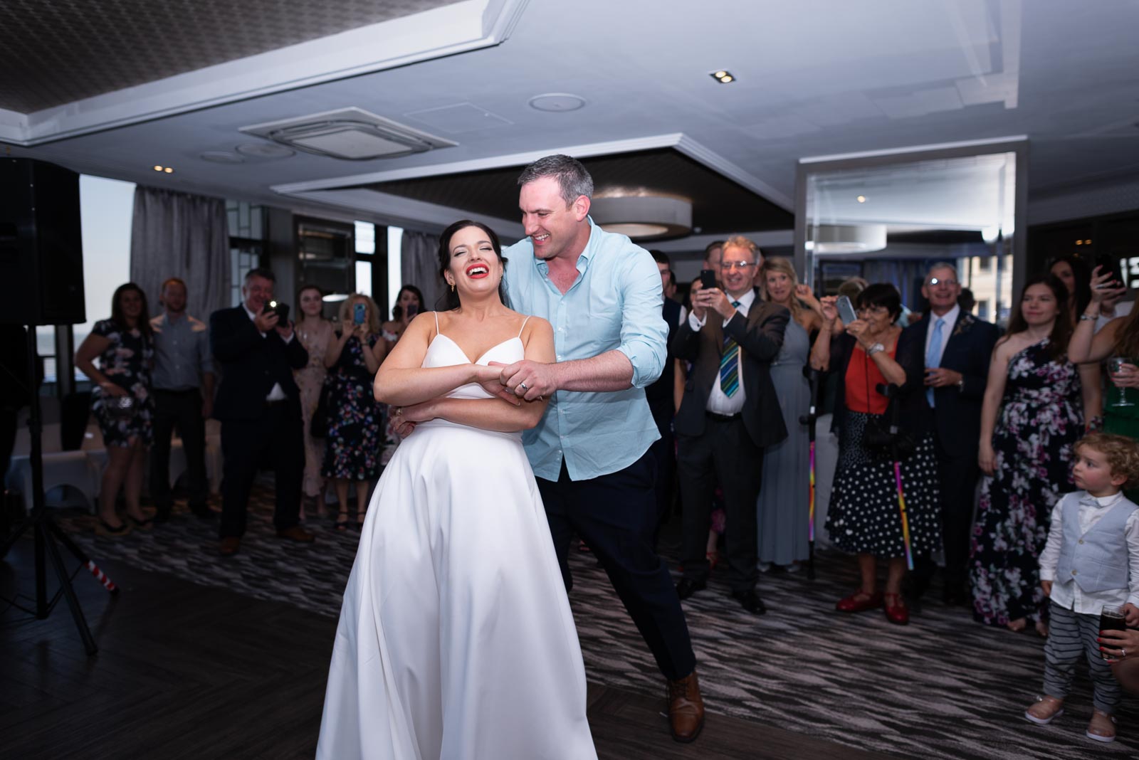 Ally and Jane enjoy their first dance after their wedding at Grand Hotel, Eastbourne. 