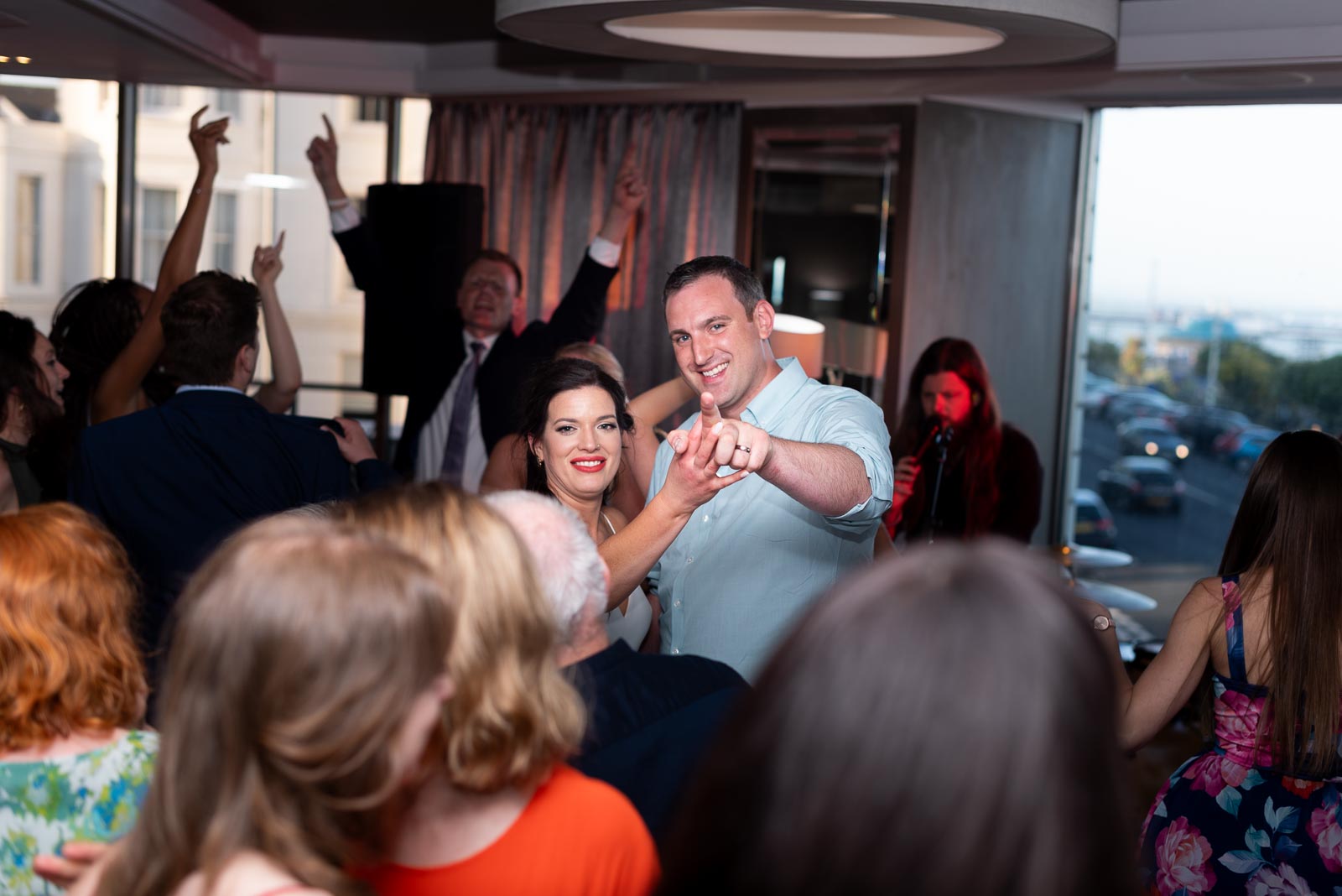 Ally and Jane spot the camera during their first dance after their wedding at Grand Hotel, Eastbourne. 