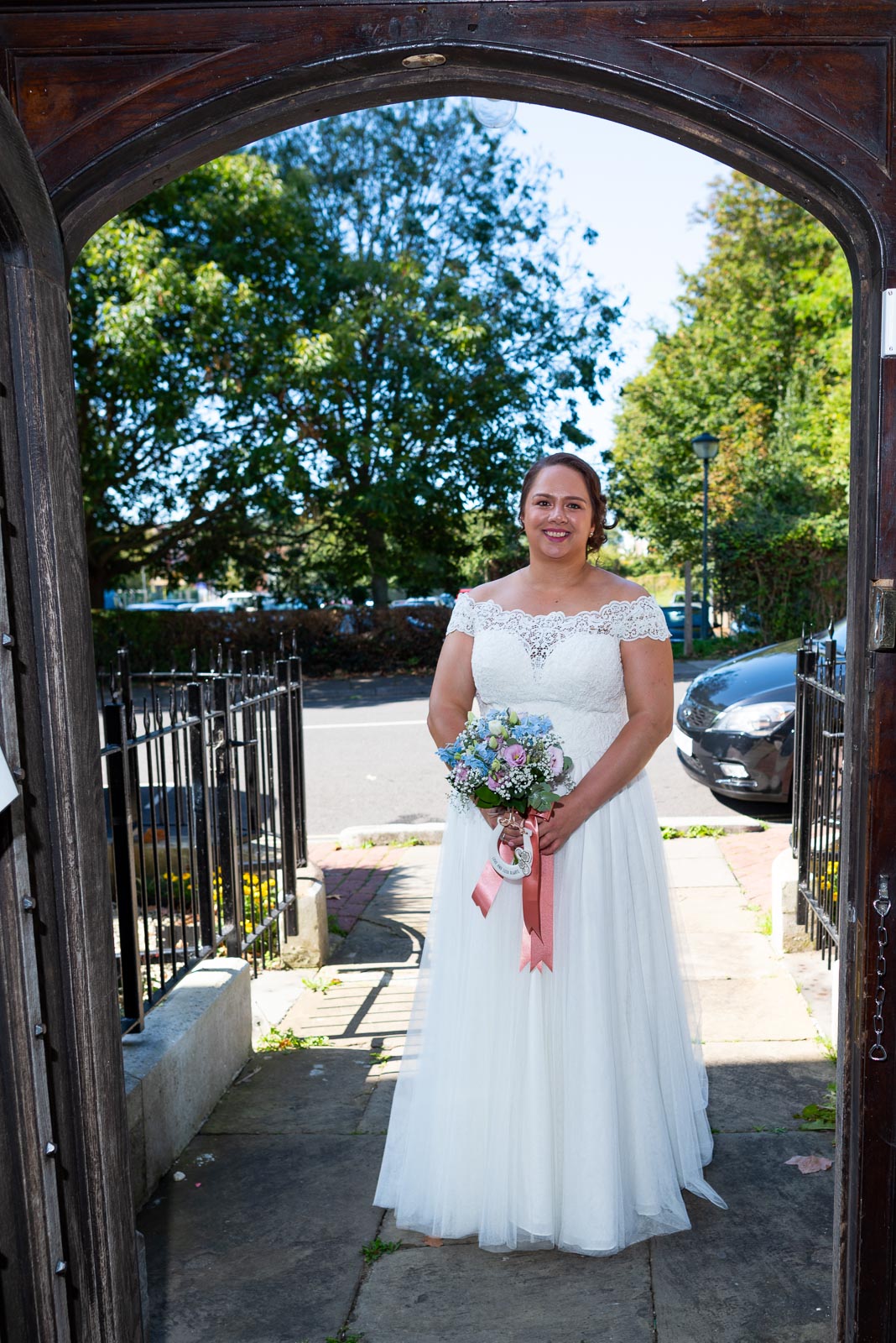 Amy arrives at the front door of Lewes Register Office before her wedding to James.