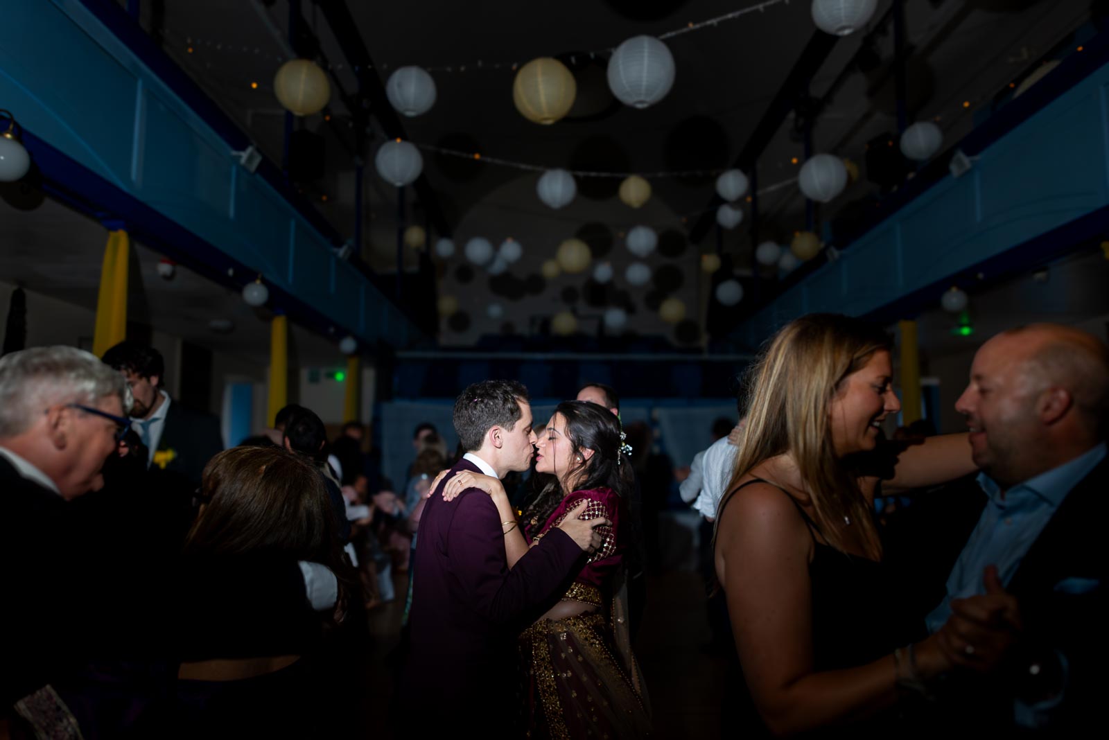 Ashley and Anjana embrace during the first dance at their Wedding Reception in the All Saint's Centre, Lewes.