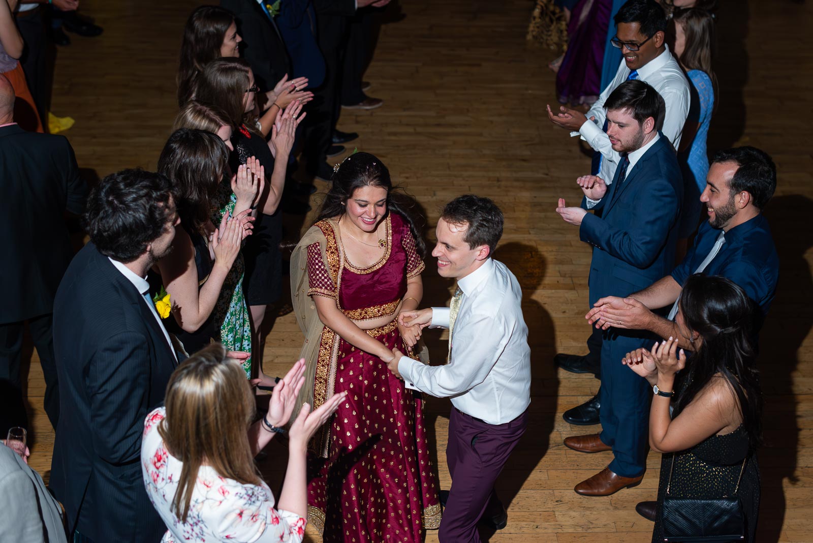 Ashley and Anjana enjoy some traditonal country dancing at their Wedding Reception in the All Saint's Centre, Lewes.