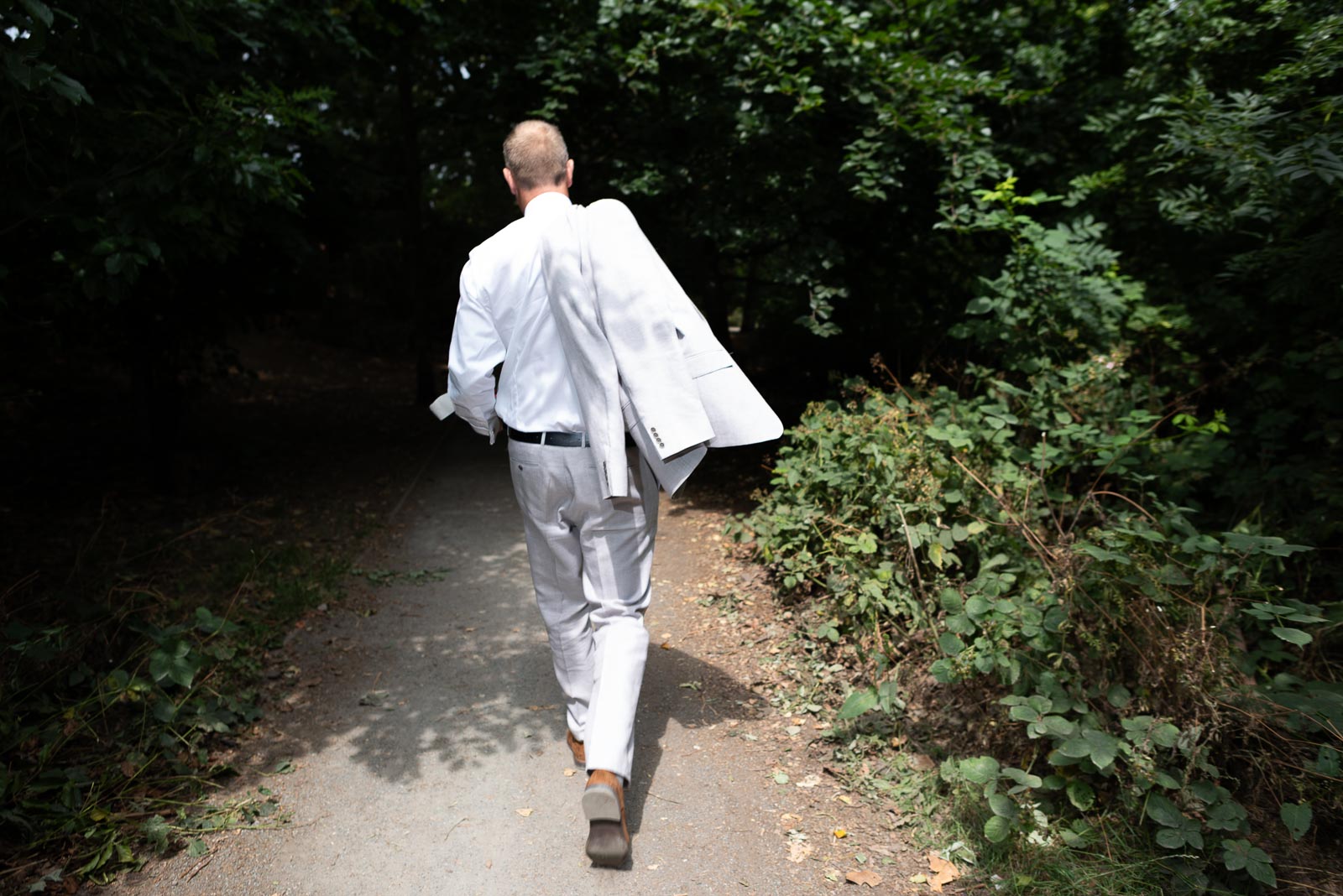 Will walks through Queen's Park London on his way to marry Kitty at the Bandstand.