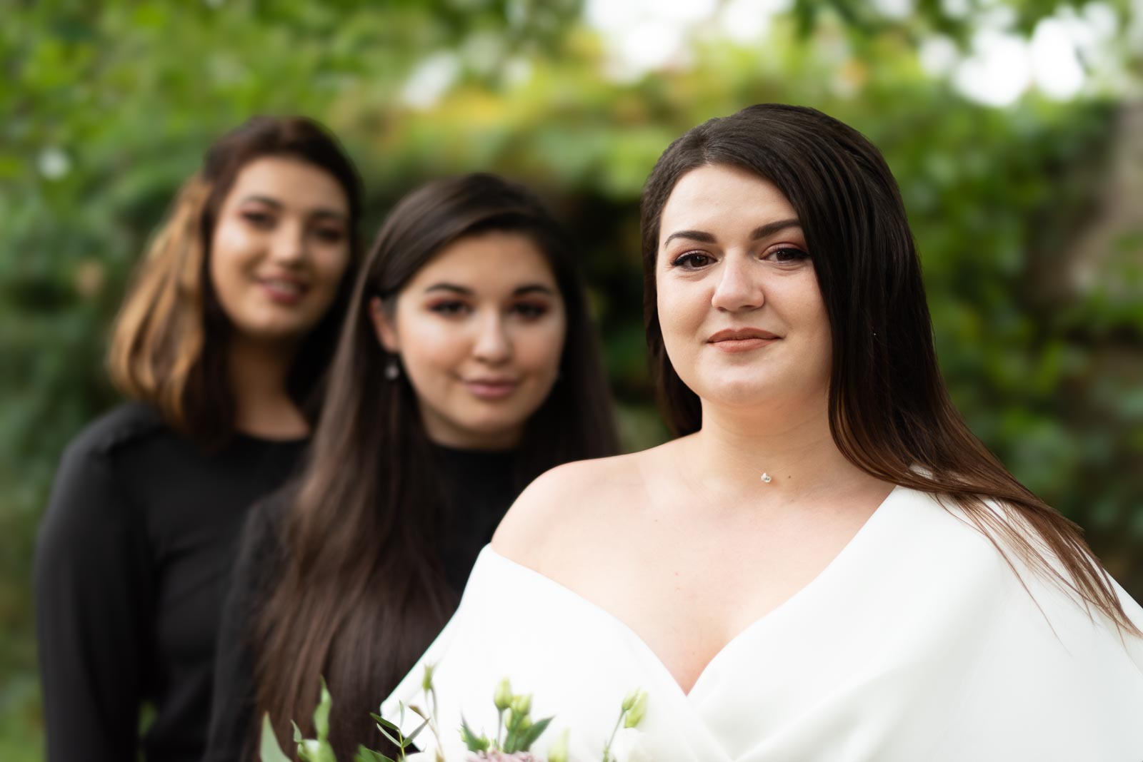 Maria poses with her bridesmaids in Southover Grange, Lewes after her wedding to Robert.