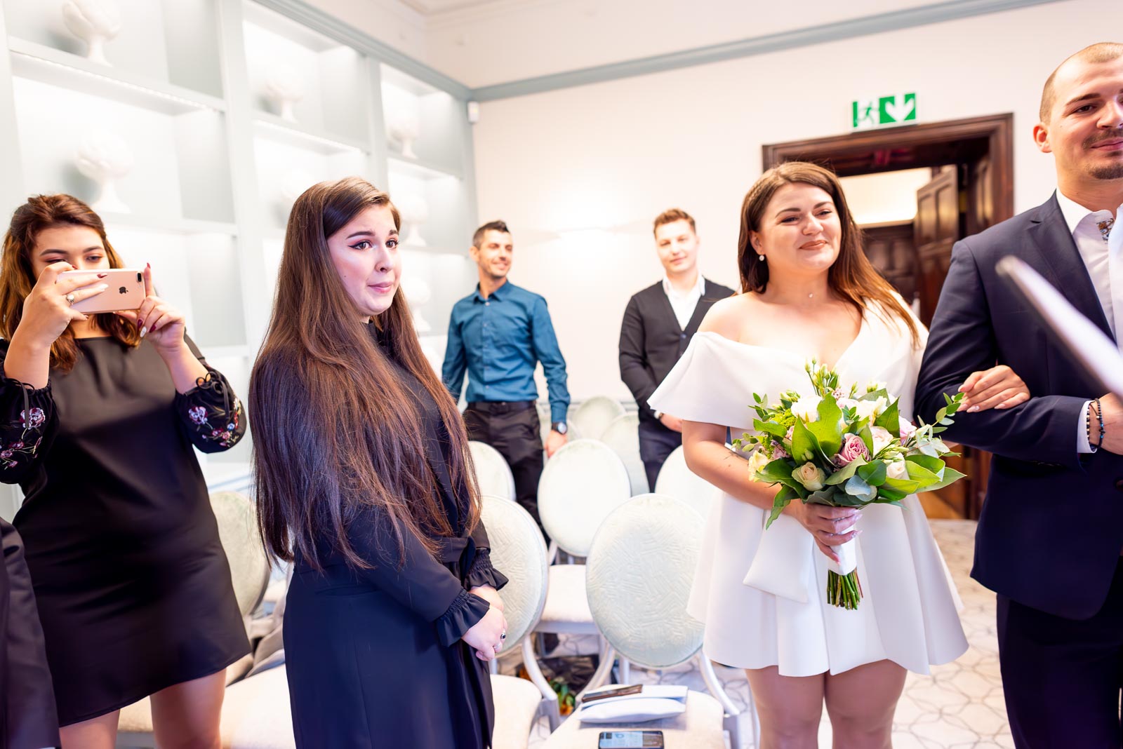 Wedding guests begin to cry in the in the Evelyn room at Lewes Register Office before Robert and Maria's Wedding.