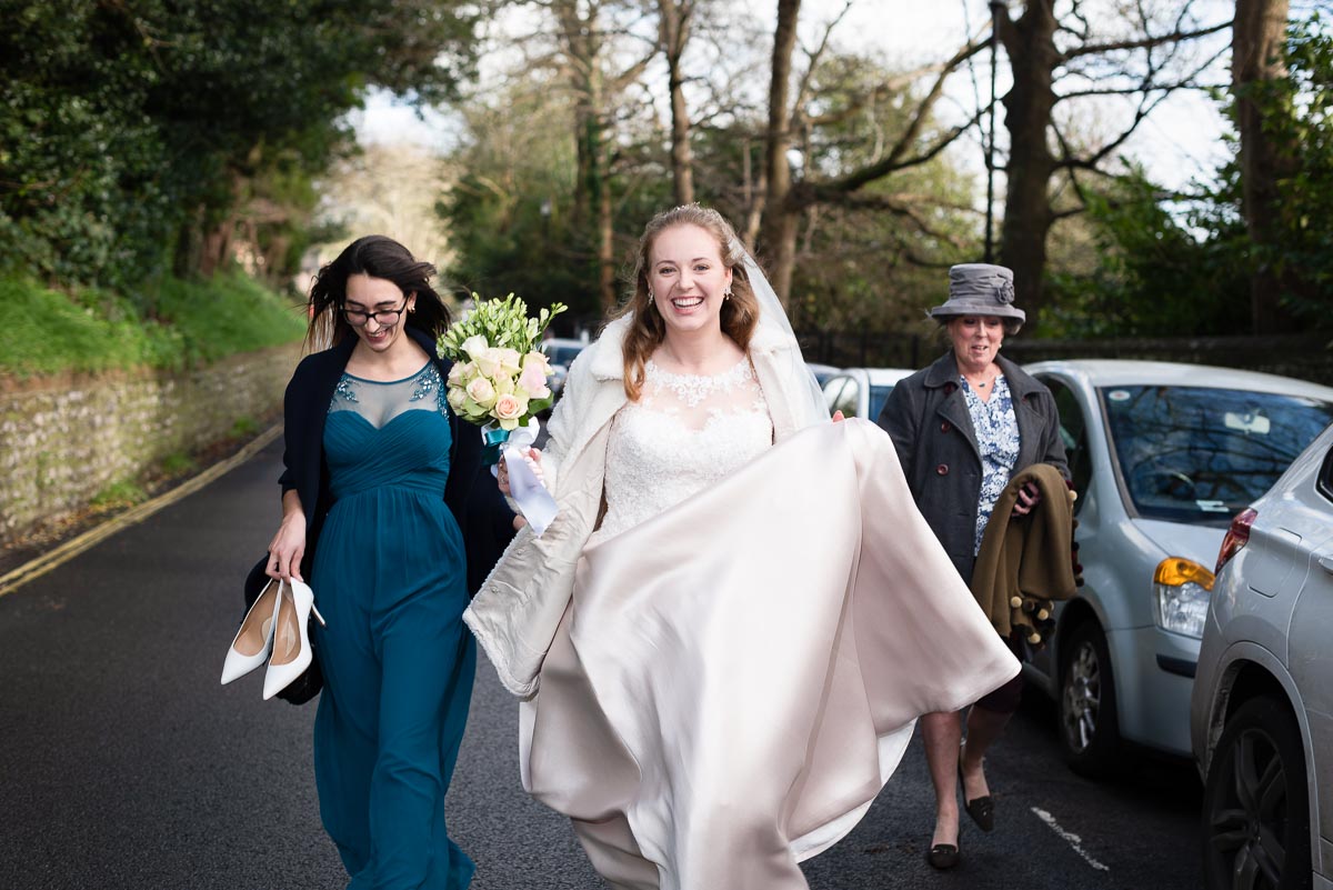Belinda walks up Grange Road with her mum and sister on her way to get married to Chris in Lewes Register Office.