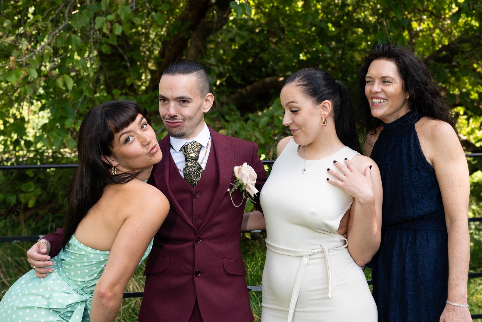 Ady pouts with his sisters in Southover Grange after his marriage to Jose in Lewes Registry Office.