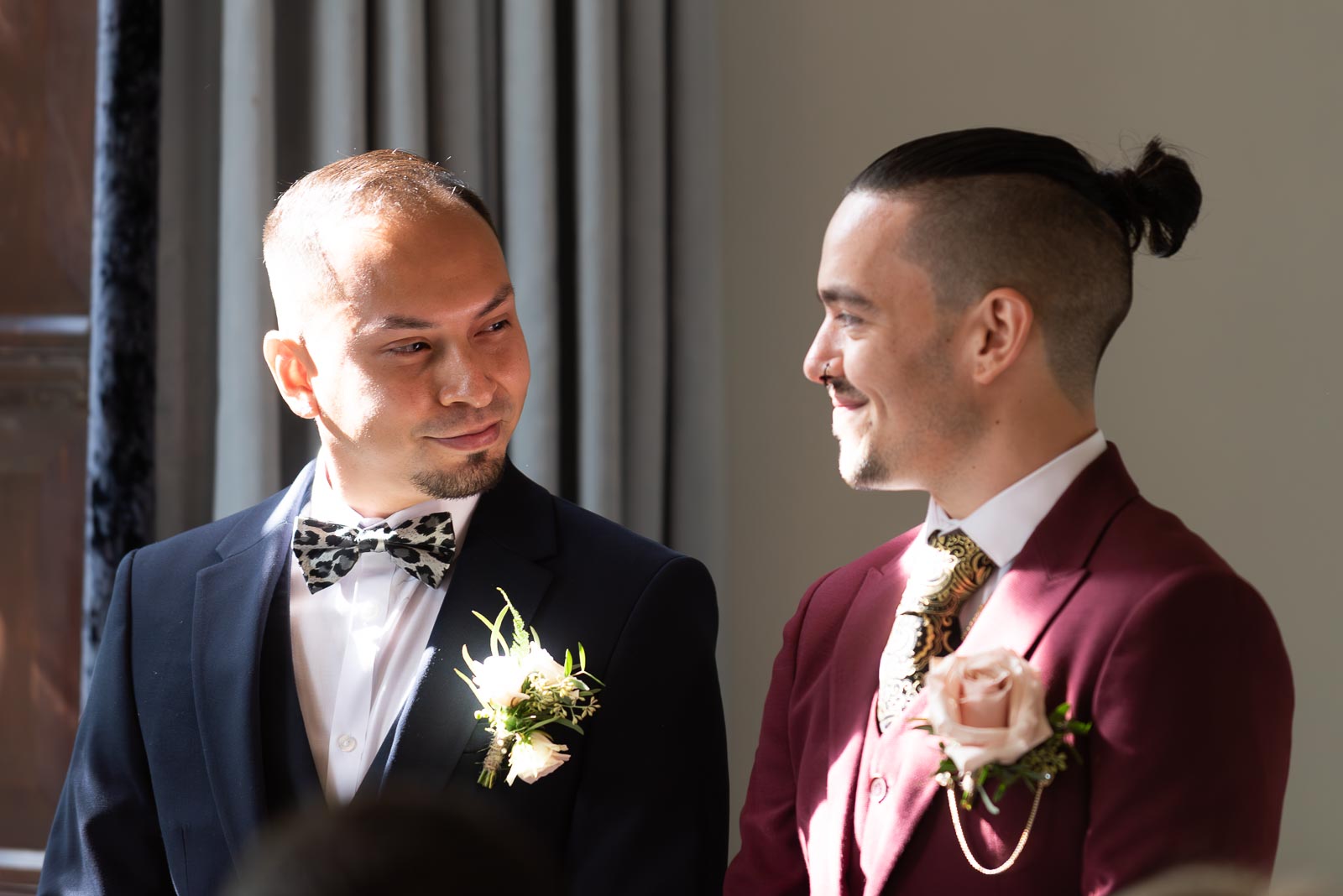 Ady and Jose smile at eachother before getting married at Lewes Registry Office. 