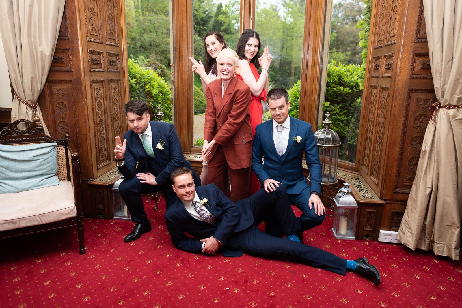 Jeff and Carmen'schildren pull a 007 pose in Manor by the Lake in Cheltenham after their wedding.
