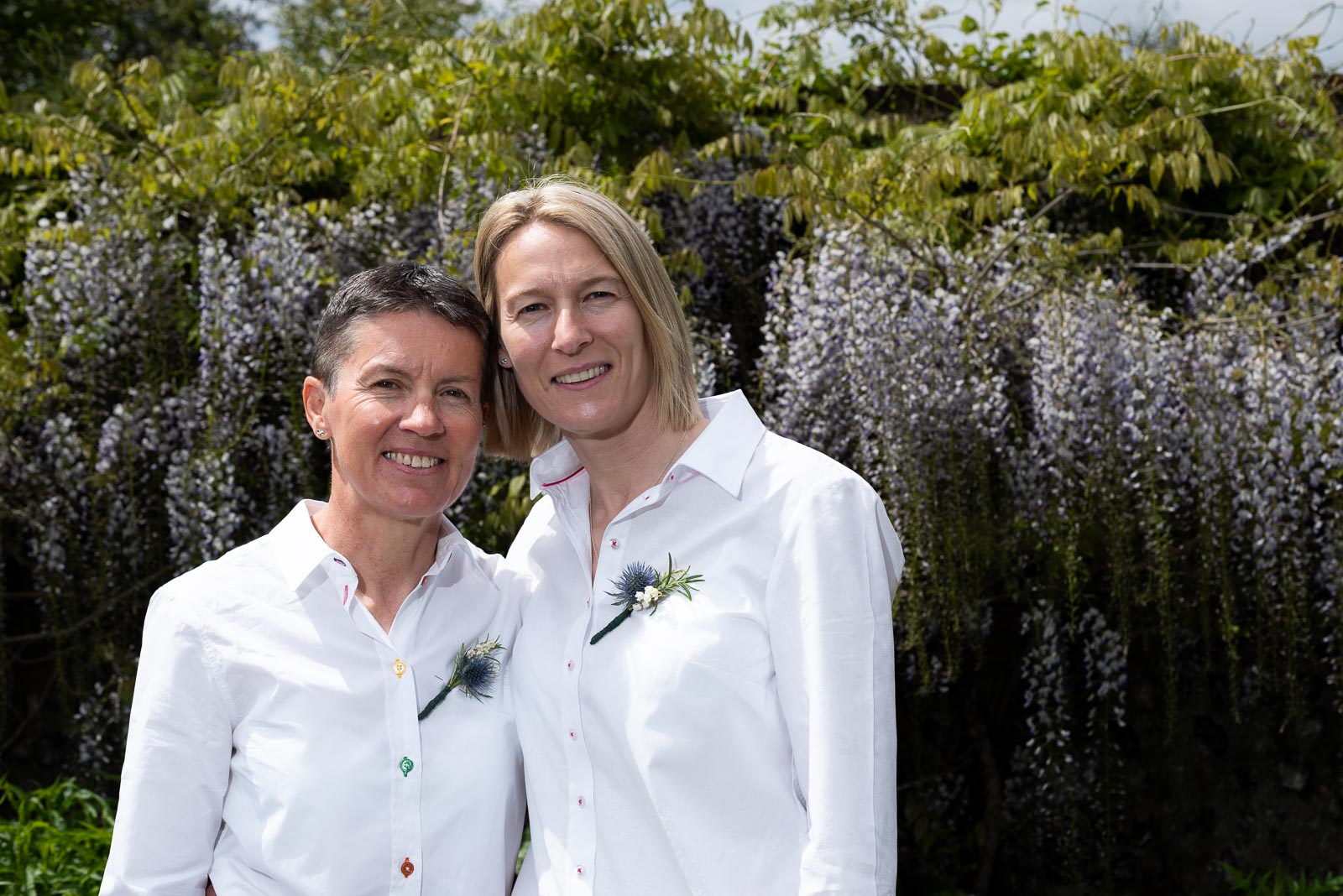 Kate and Sam pose in Southover Grange after their wedding at Lewes.