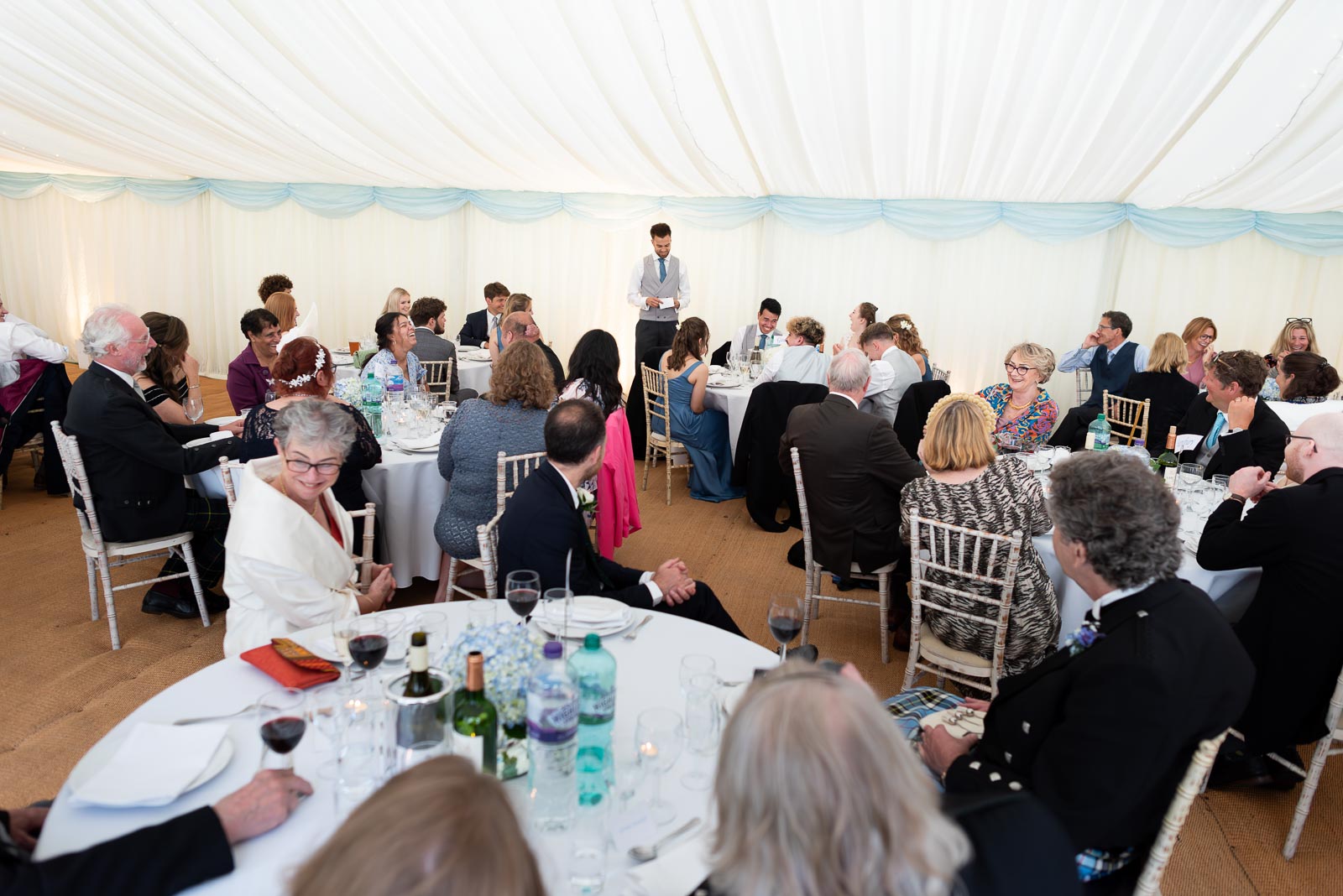 Callum's best man gives a speech at the wedding breakfast in Iford.