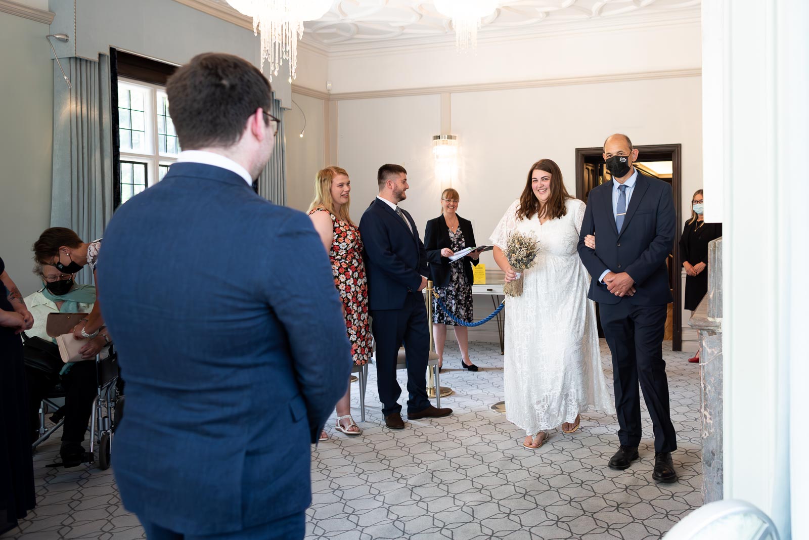 Sophie arrives at the bottom of the aisle before her wedding to Nathan in the Ainsworth Room at Lewes Register Office.