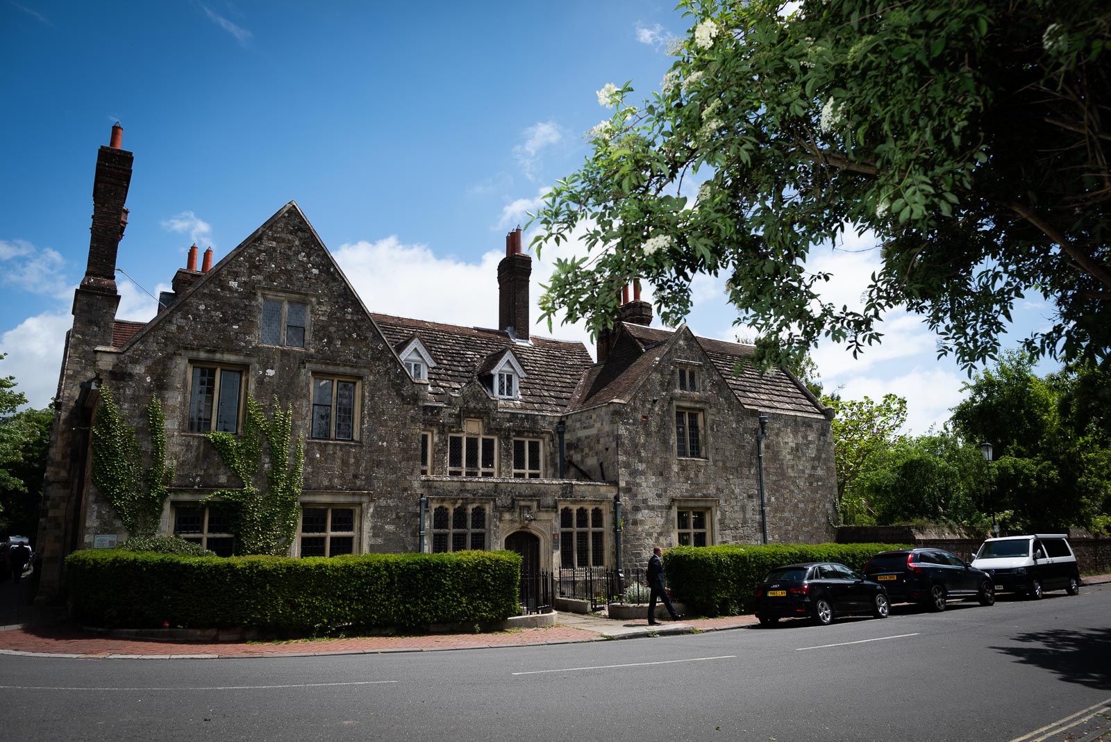 The front exterior of Lewes Register Office against a blue sky on a beautiful Summer's day.