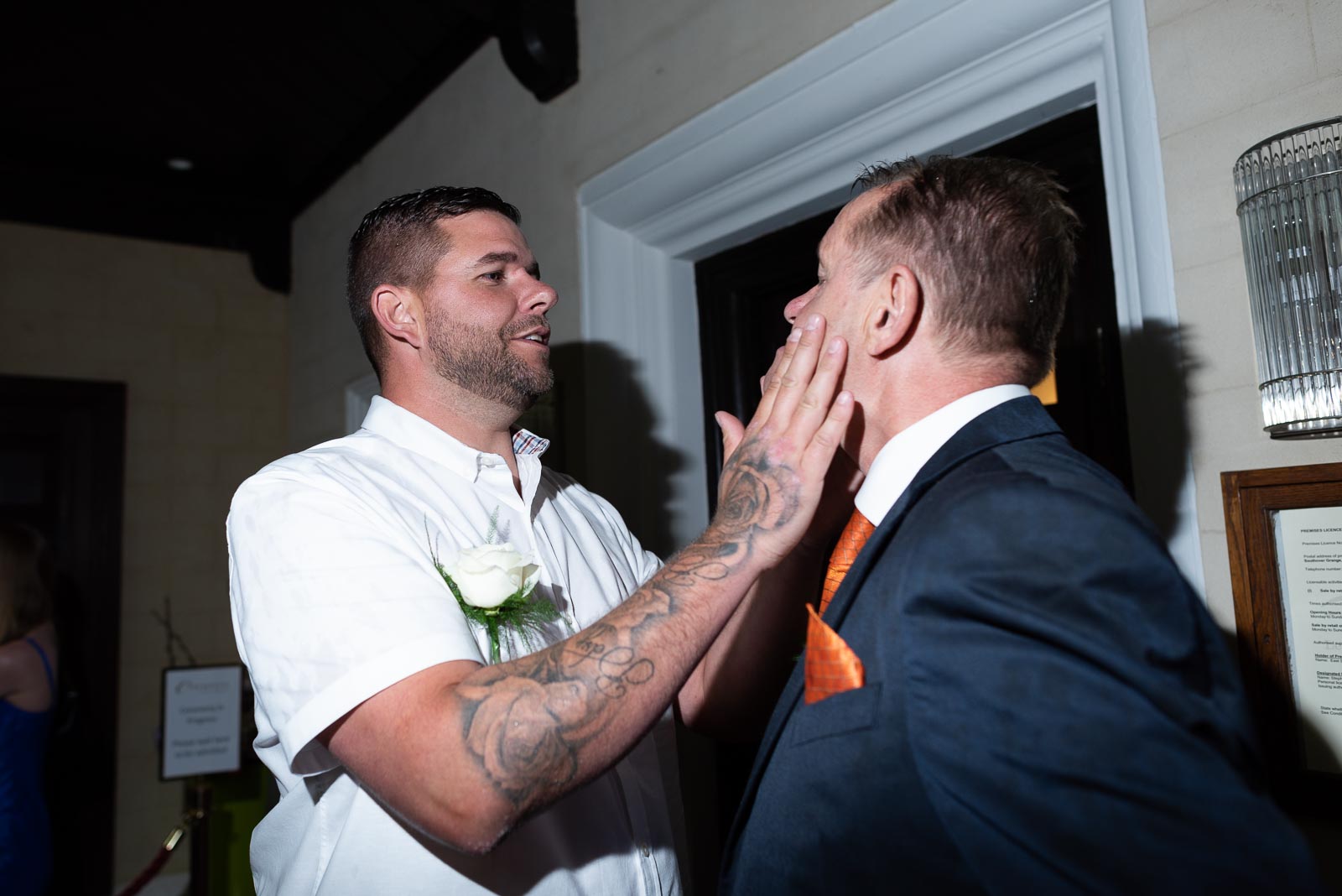 Martin's son dries the rain off his face inside Lewes Register Office before his wedding to Joanne. 