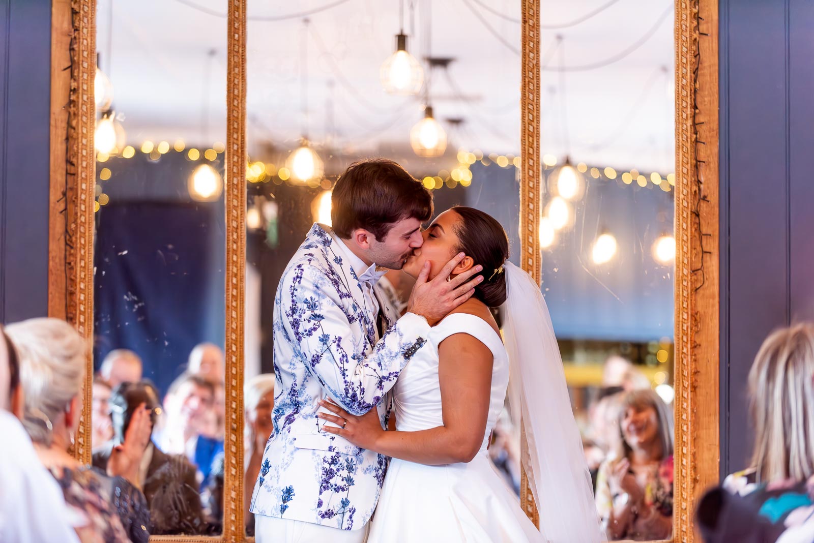 Olivia and Edward embrace after becoming husband and wife at the function room at The Royal Oak in Lewes surrounded by friends and family.