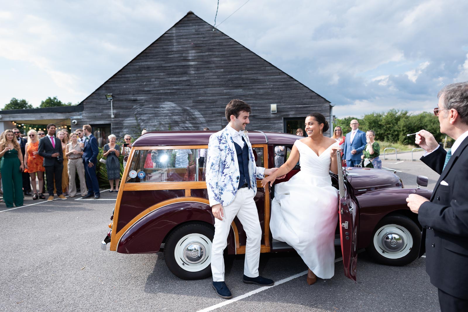 Olivia and Edward arrive at Beechwood Hall & Rural Park, Cookbridge in a well maintained Morris Minor Traveller for their Wedding Reception.