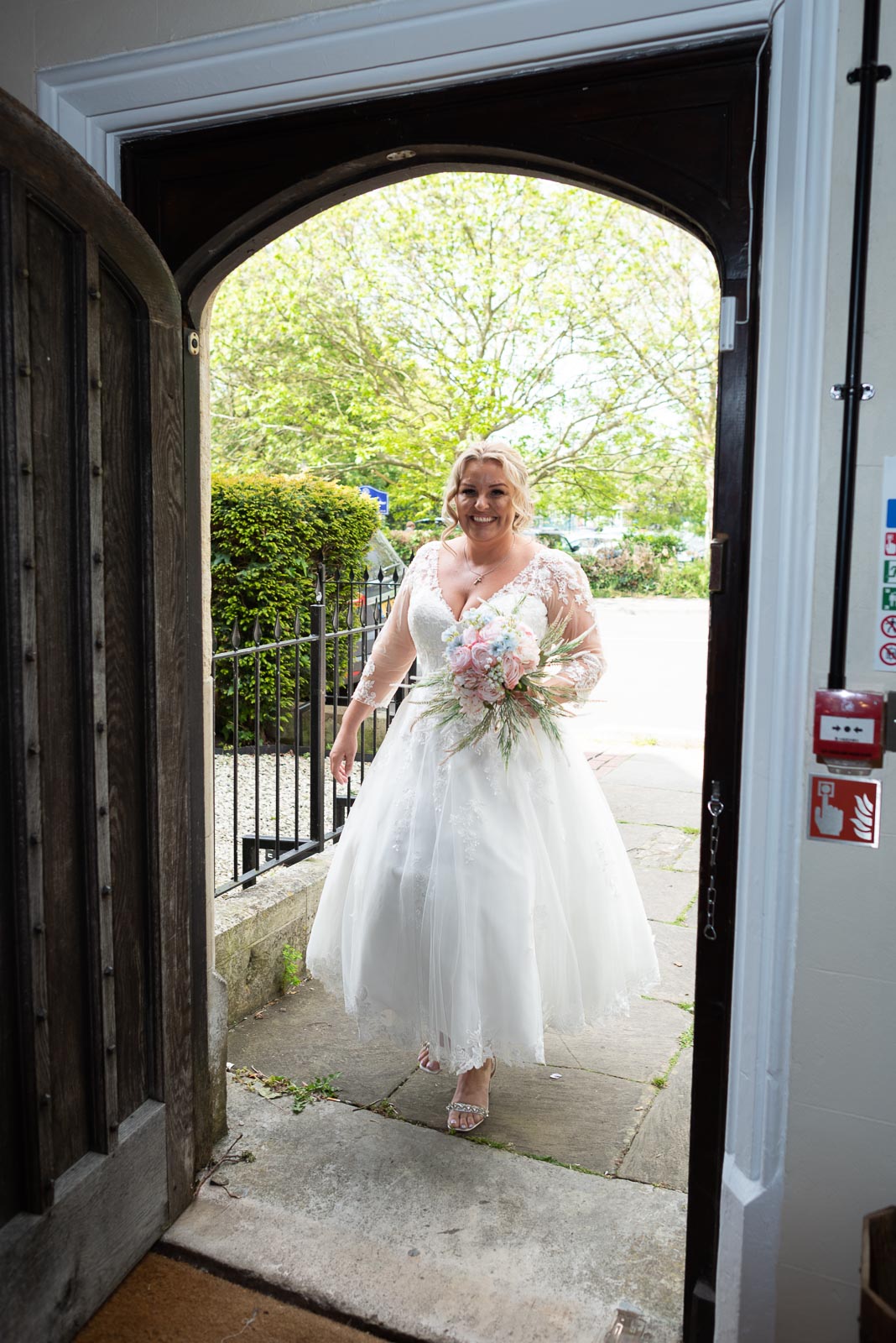 Lou arrives at the door of Lewes Register office before marrying Matt.