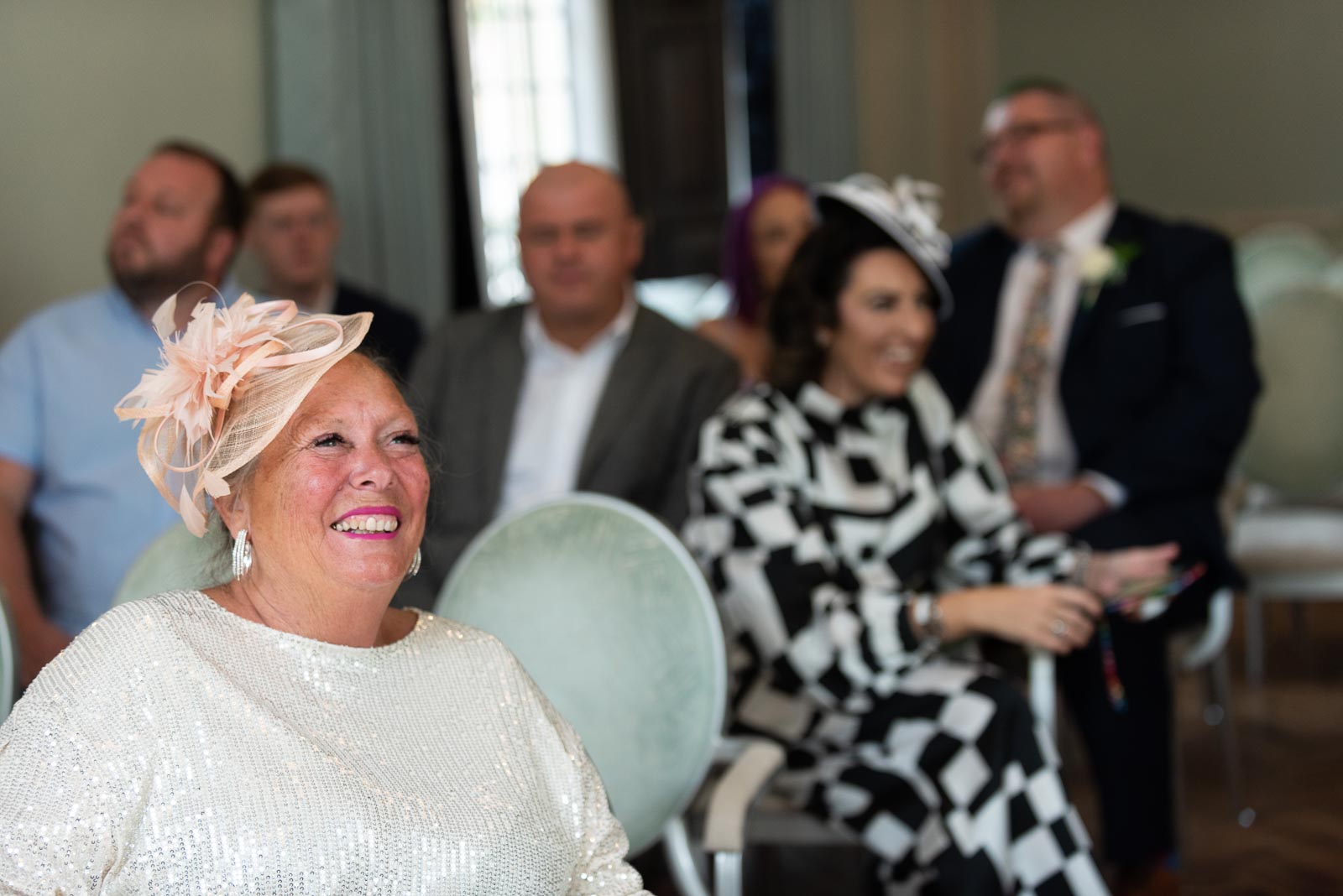 Matt's mum enjoys a funny moment in the Ainsworth Room at Lewes Register Office.