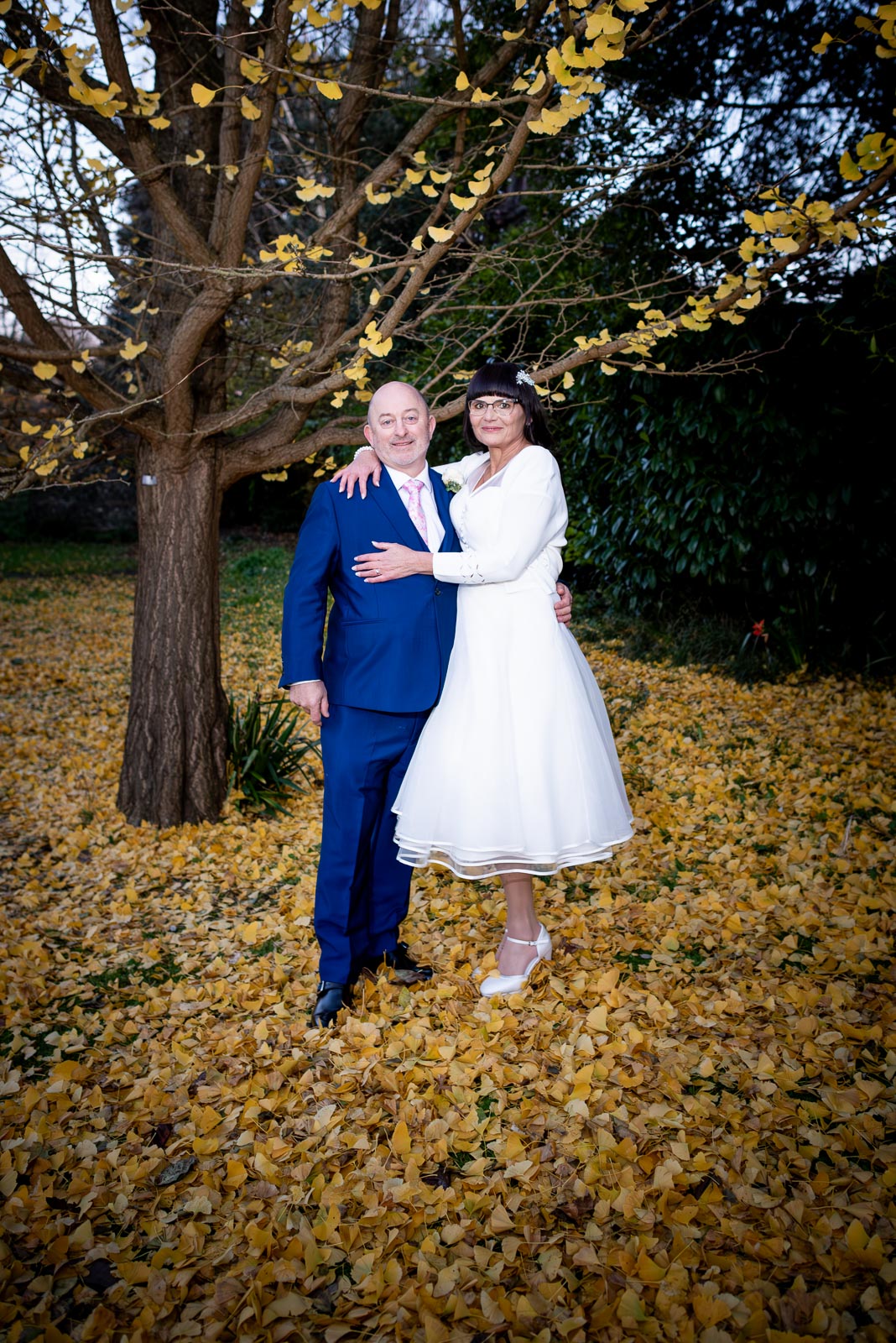 Andy and Caron pose underneath an Autumnal in Southover Grange, Lewes.