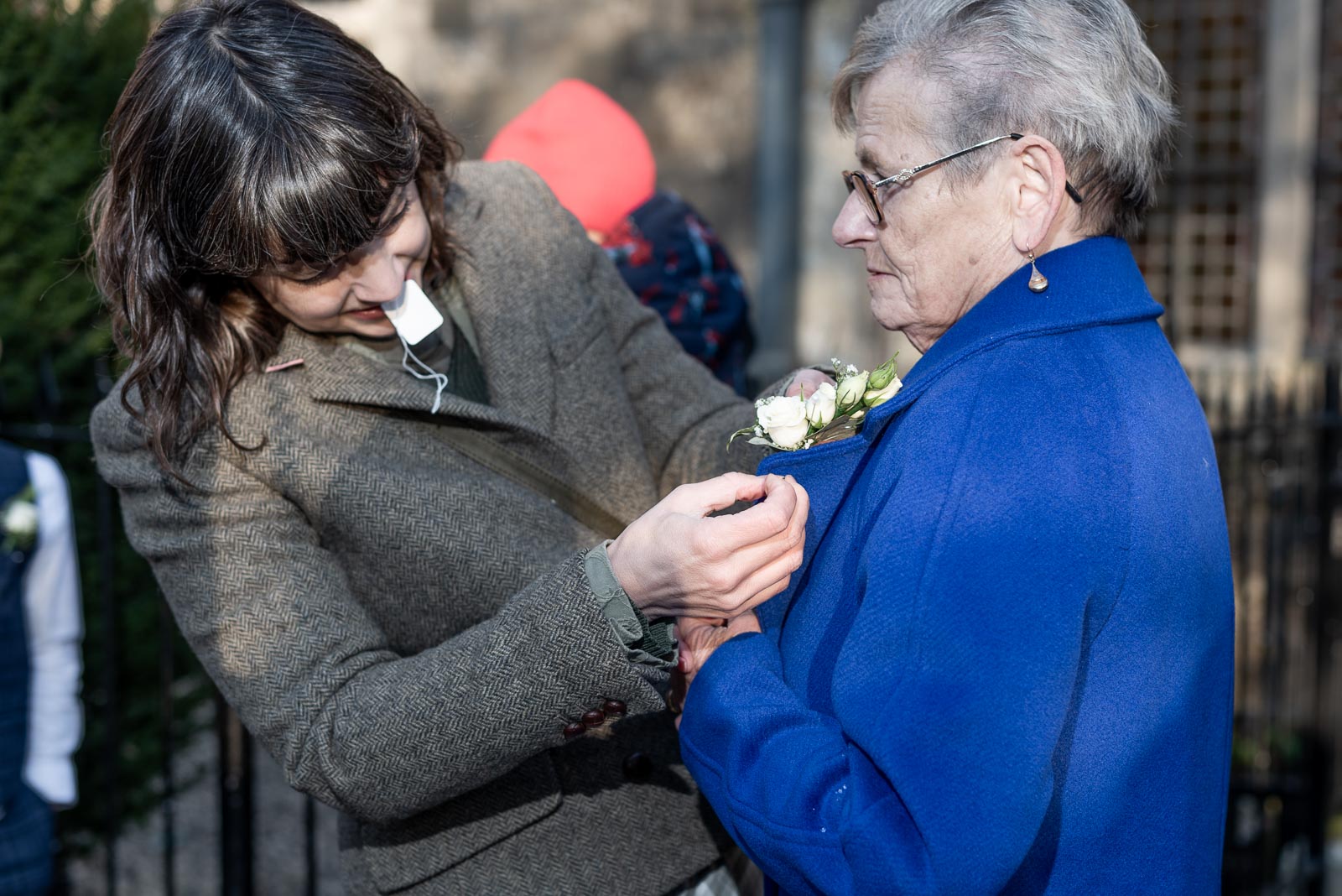 A wedding pin is put on Caron's mum before her wedding to Andy at Lewes Registry Office.