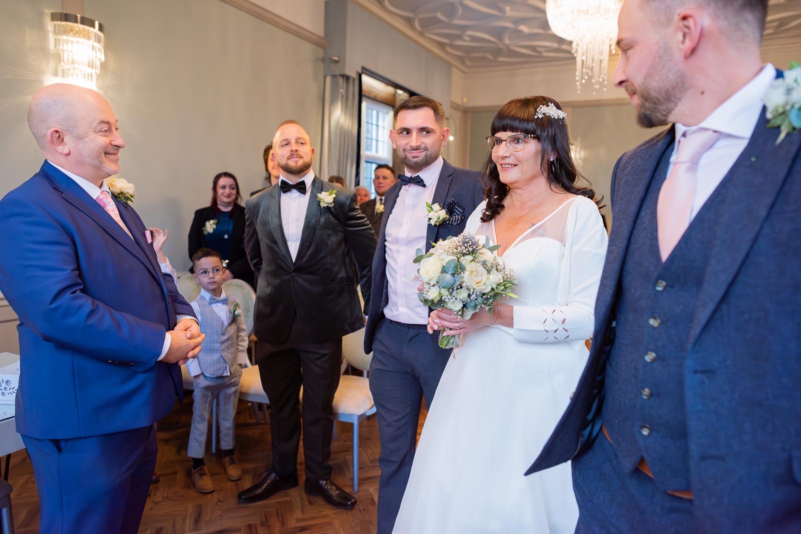 Caron arrives at the bottom of the aisle to a smiling Andy before there wedding at the Ainsworth Room in Lewes Registry Office.  