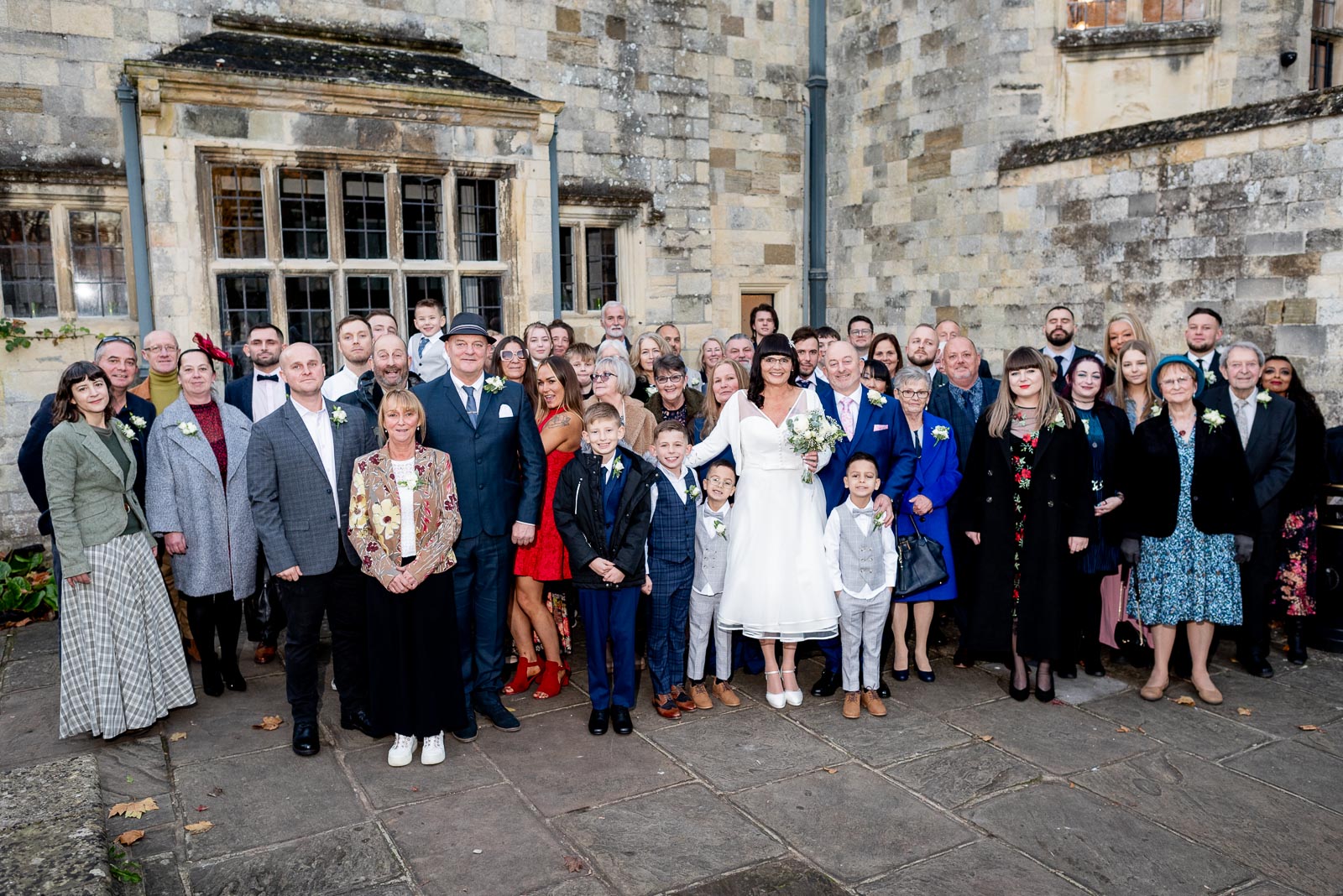 Andy and Caron pose with their wedding party outside Lewes Registry Office.