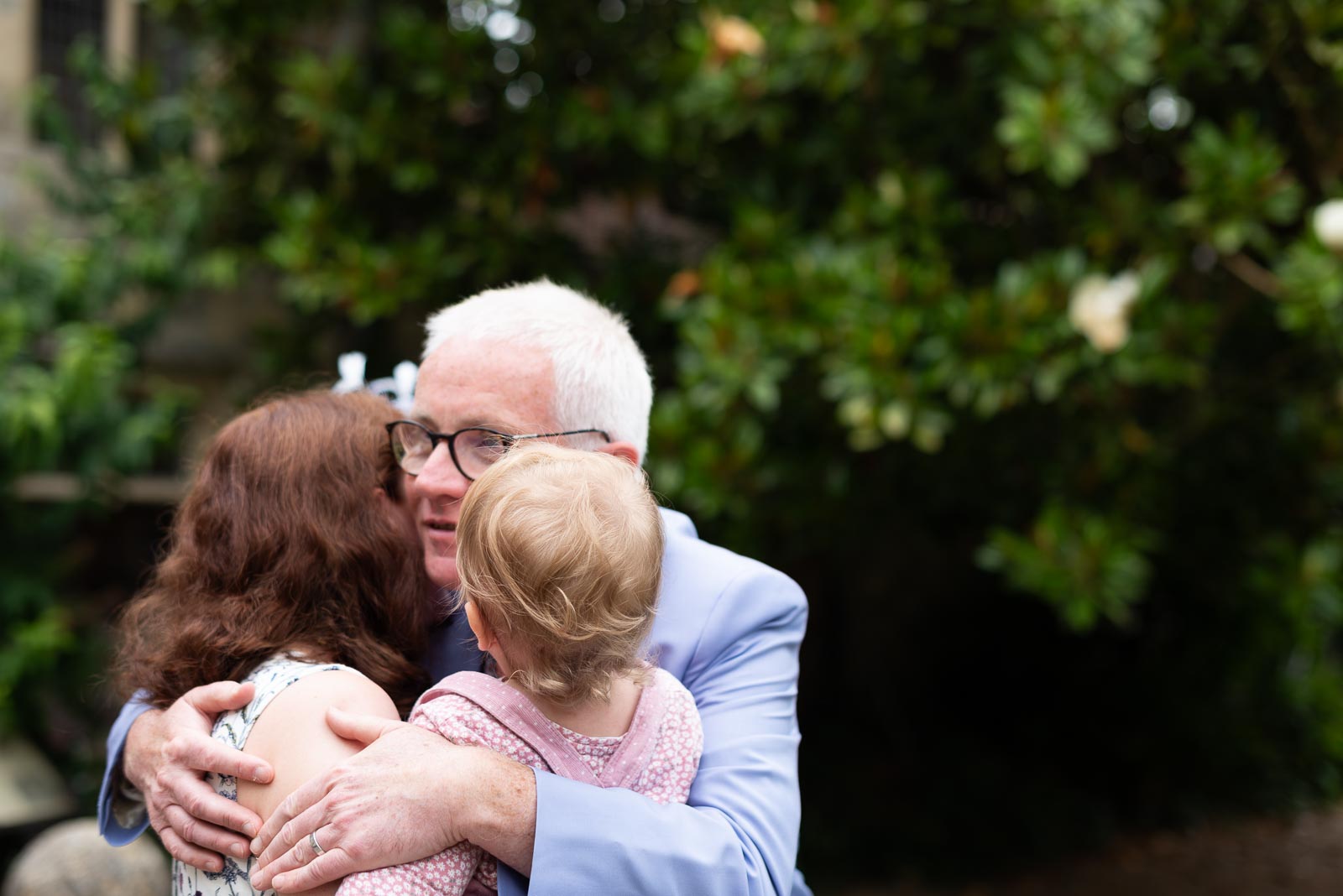 Julian greets his guests with a hug in Southover Grange in Lewes