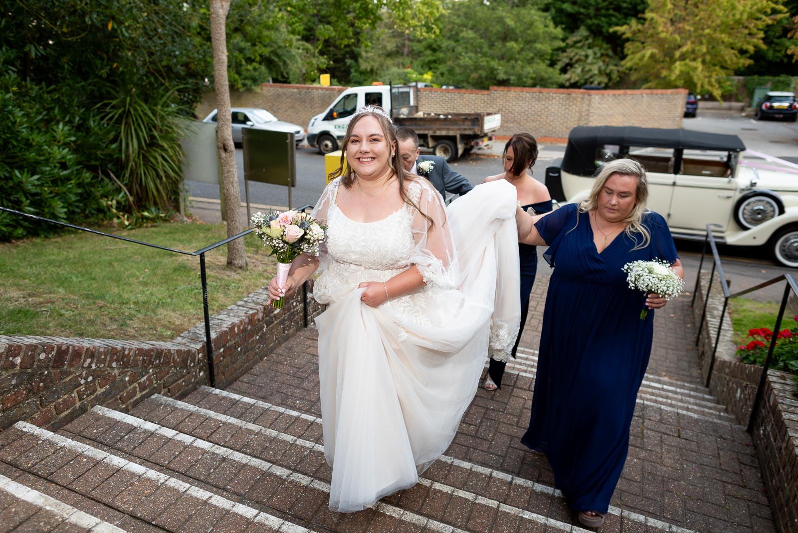 Catherine climbs the steps at Haywards Heath Town Hall to get married to Steve