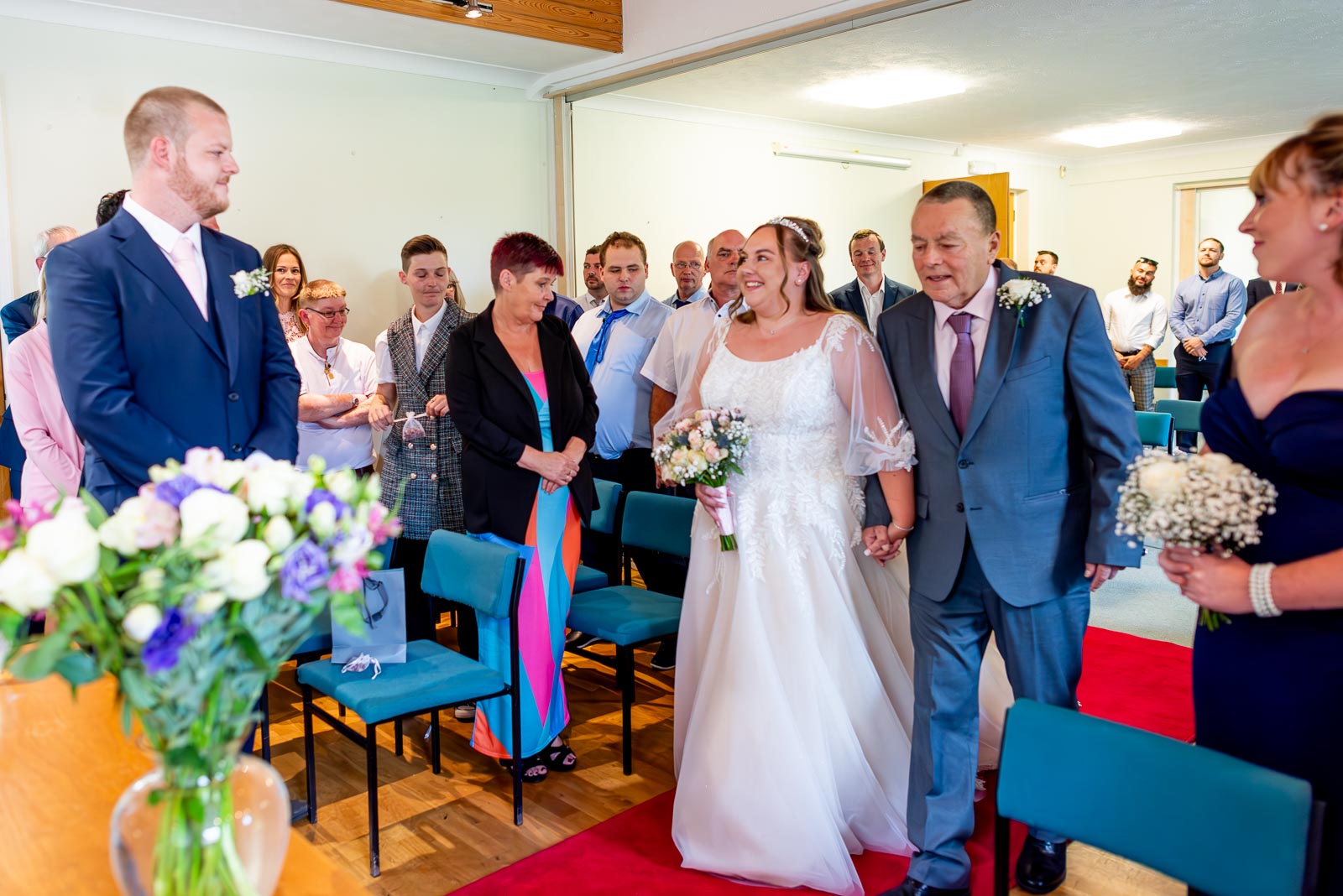 Catherine walks down the aisle with her dad at Haywards Heath Town Hall  to get married to Steve