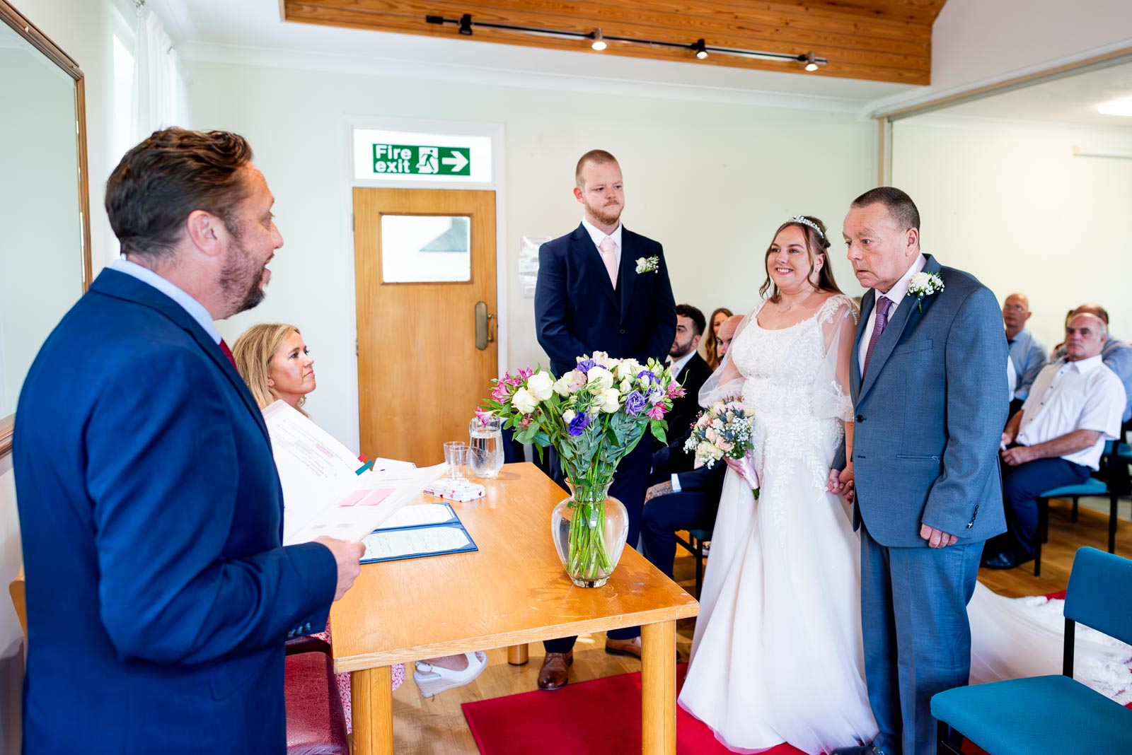 Catherine arrives down the aisle with her dad at Haywards Heath Town Hall  to get married to Steve