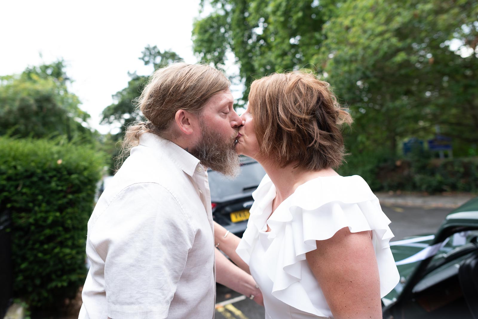 Mark greets Mary with a kiss after she arrives at Lewes Register Office