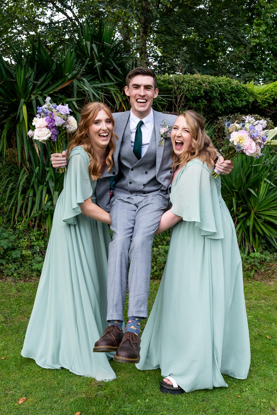 Mark is lifted by May's Bridesmaids in Southover Grange in Lewes