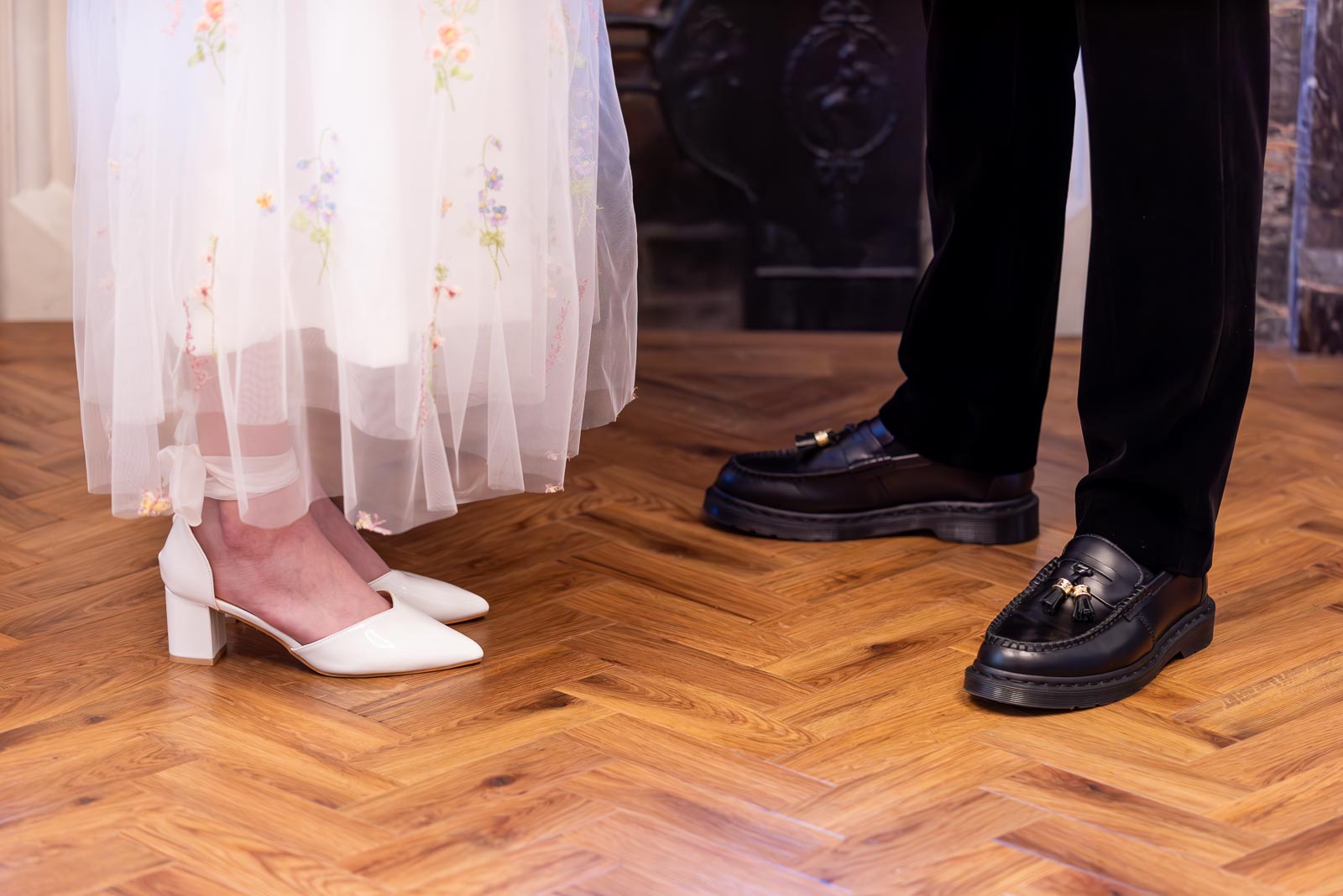 Lola and Laurence's shoes after arriving at the top of the aisle in the Ainsworth Room at Lewes Registry Office.