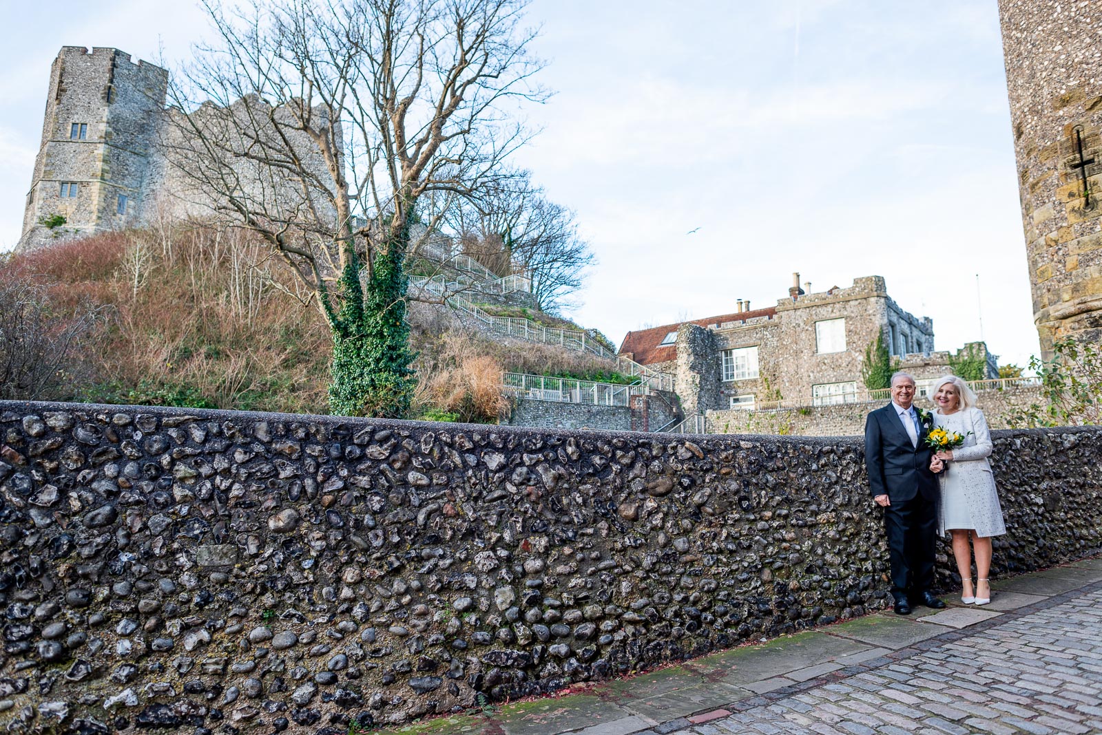 Peter and Dawn are pictured on front of Lewes Castle after their wedding. 