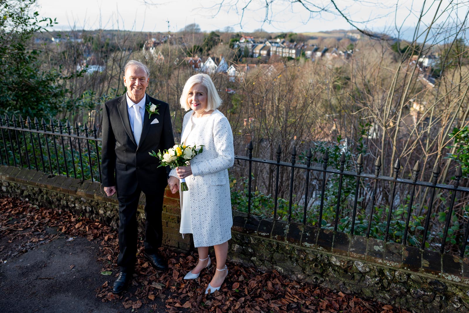 Pater and Dawn enjoy some low, late year sun after their wedding in Lewes.