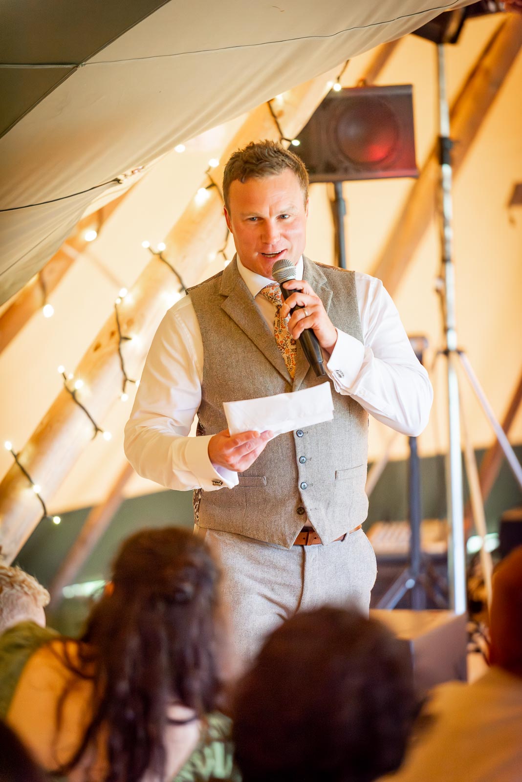 Marc's twin brother gives the best man speech after the wedding breakfast at the Party Field near Lewes.