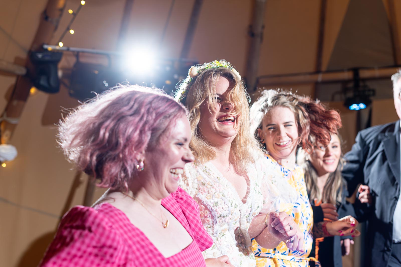 Eleanor dances with her friends following her wedding to Marc at the Party Field near Lewes.